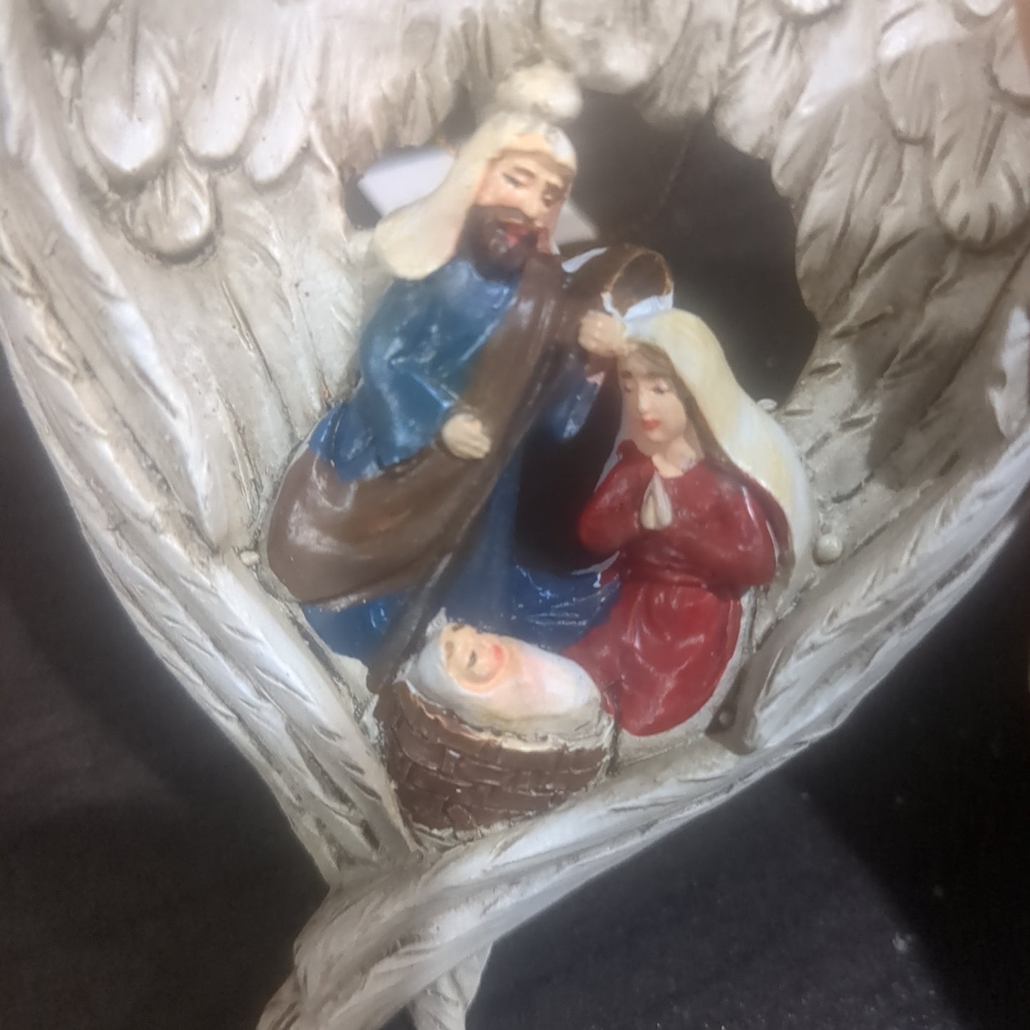 Holy Family, nativity scene in angels wings