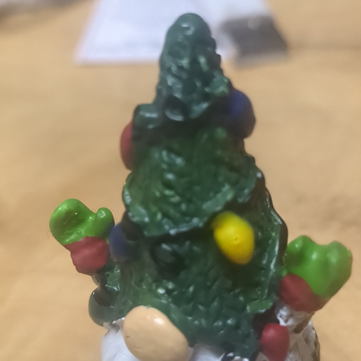 Gnome pocket charm with green hat.