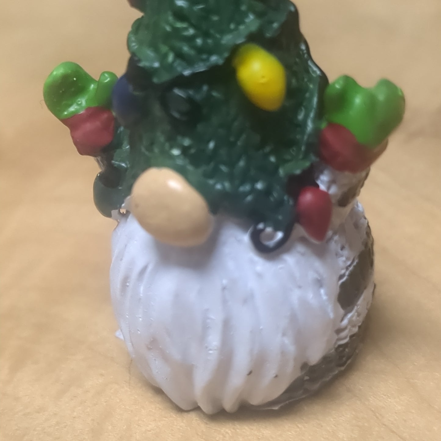 Gnome pocket charm with green hat.