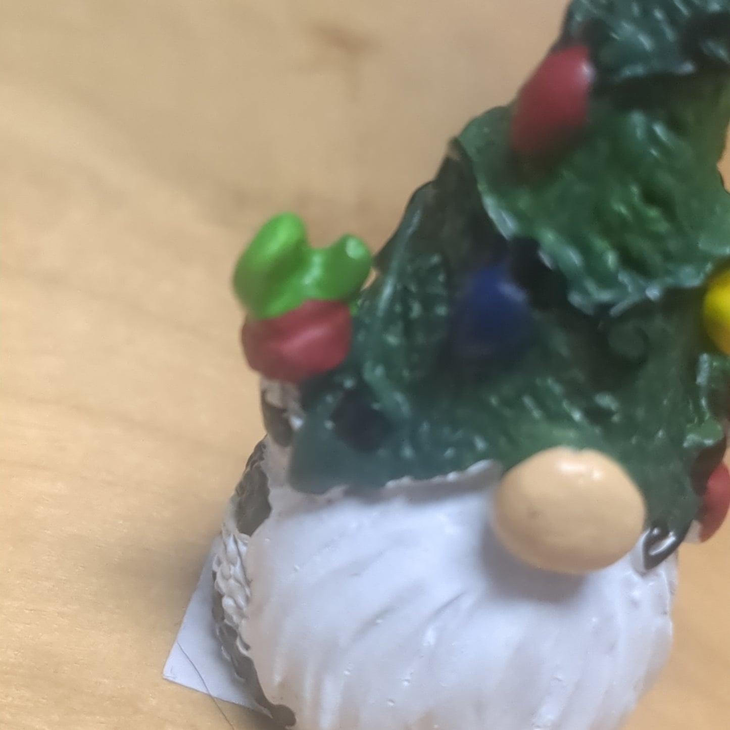 Gnome pocket charm with green hat.