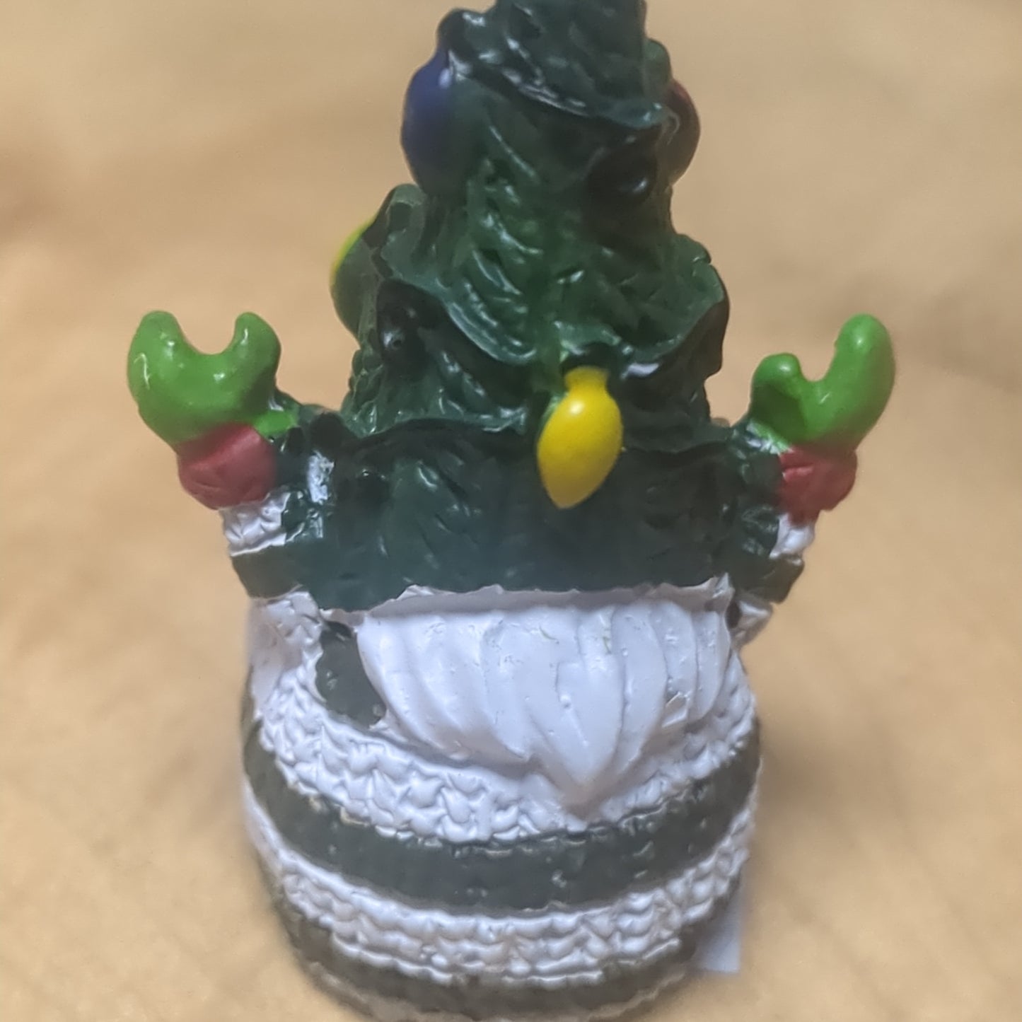 Gnome pocket charm with green hat.
