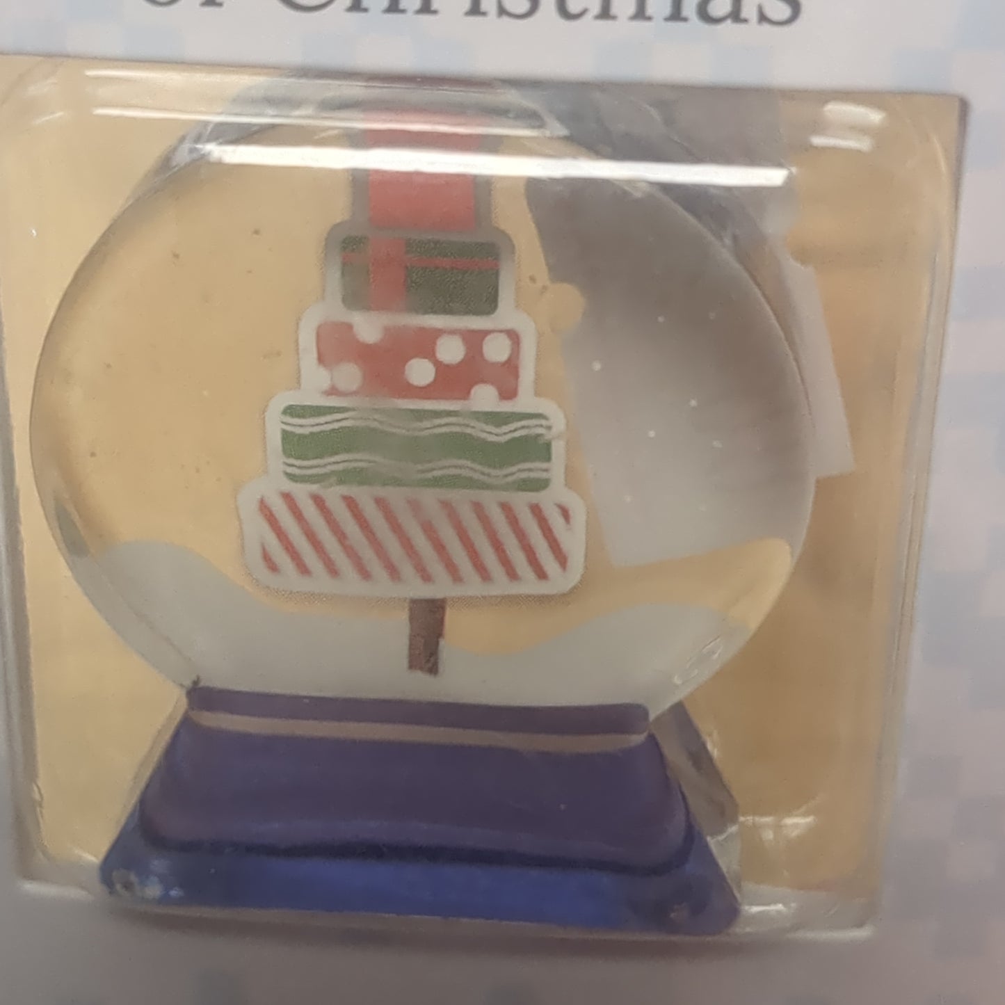 Pocket charm snow globe appearance with tree inside. friends are the true gifts of Christmas.