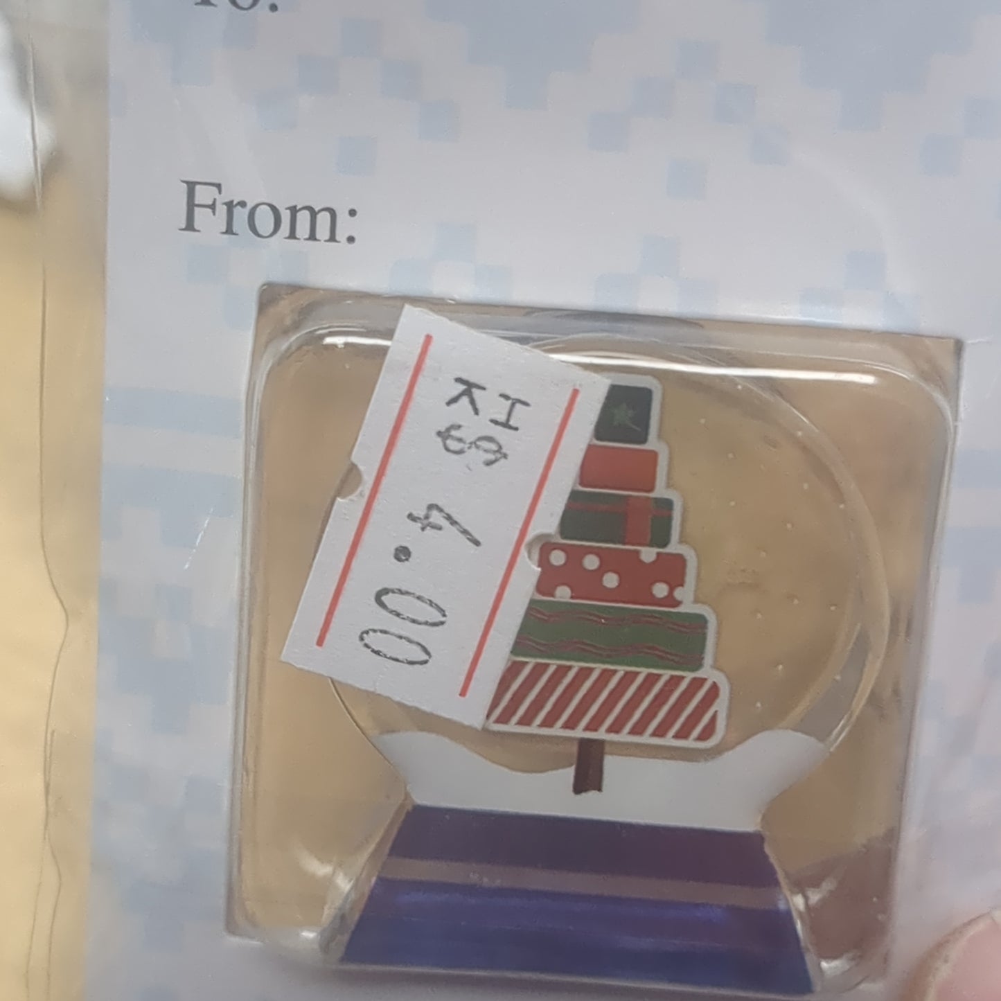 Pocket charm snow globe appearance with tree inside. friends are the true gifts of Christmas.