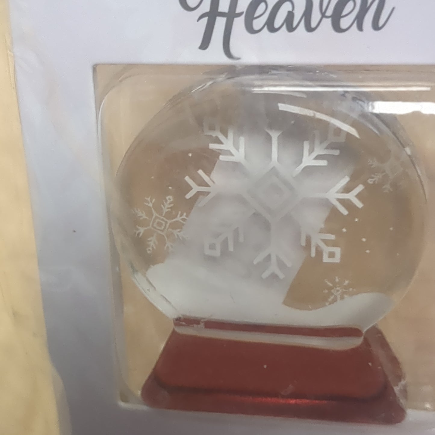 Pocket charm snow globe appearance with snowflake inside. Snowflakes are kisses from heaven