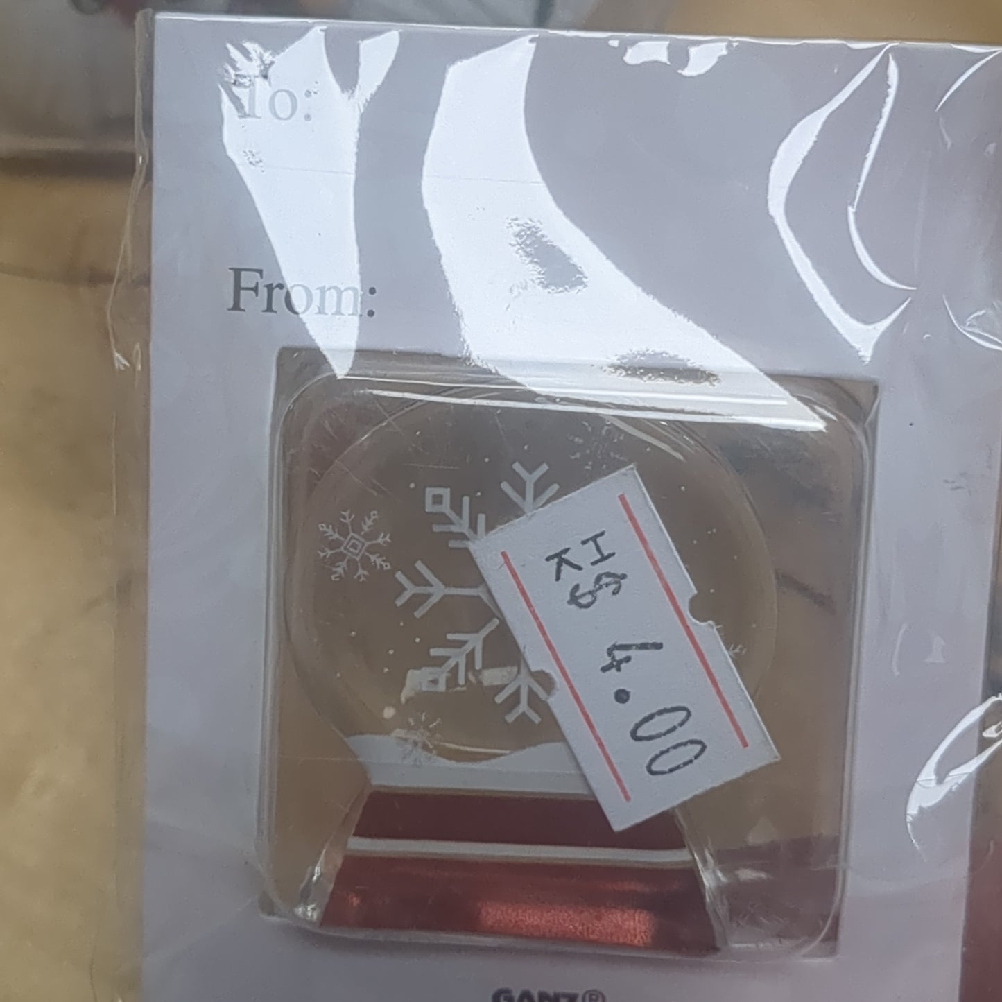 Pocket charm snow globe appearance with snowflake inside. Snowflakes are kisses from heaven