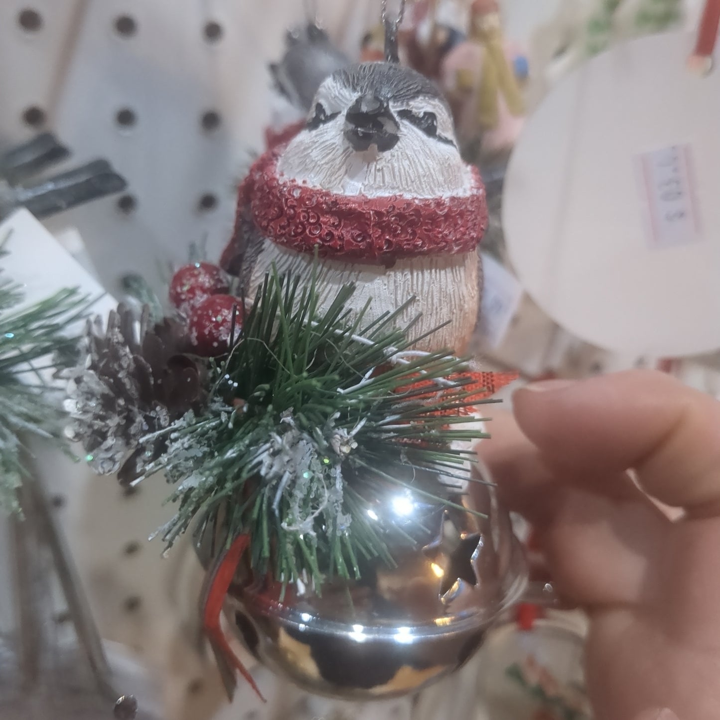 Bird on bell ornament