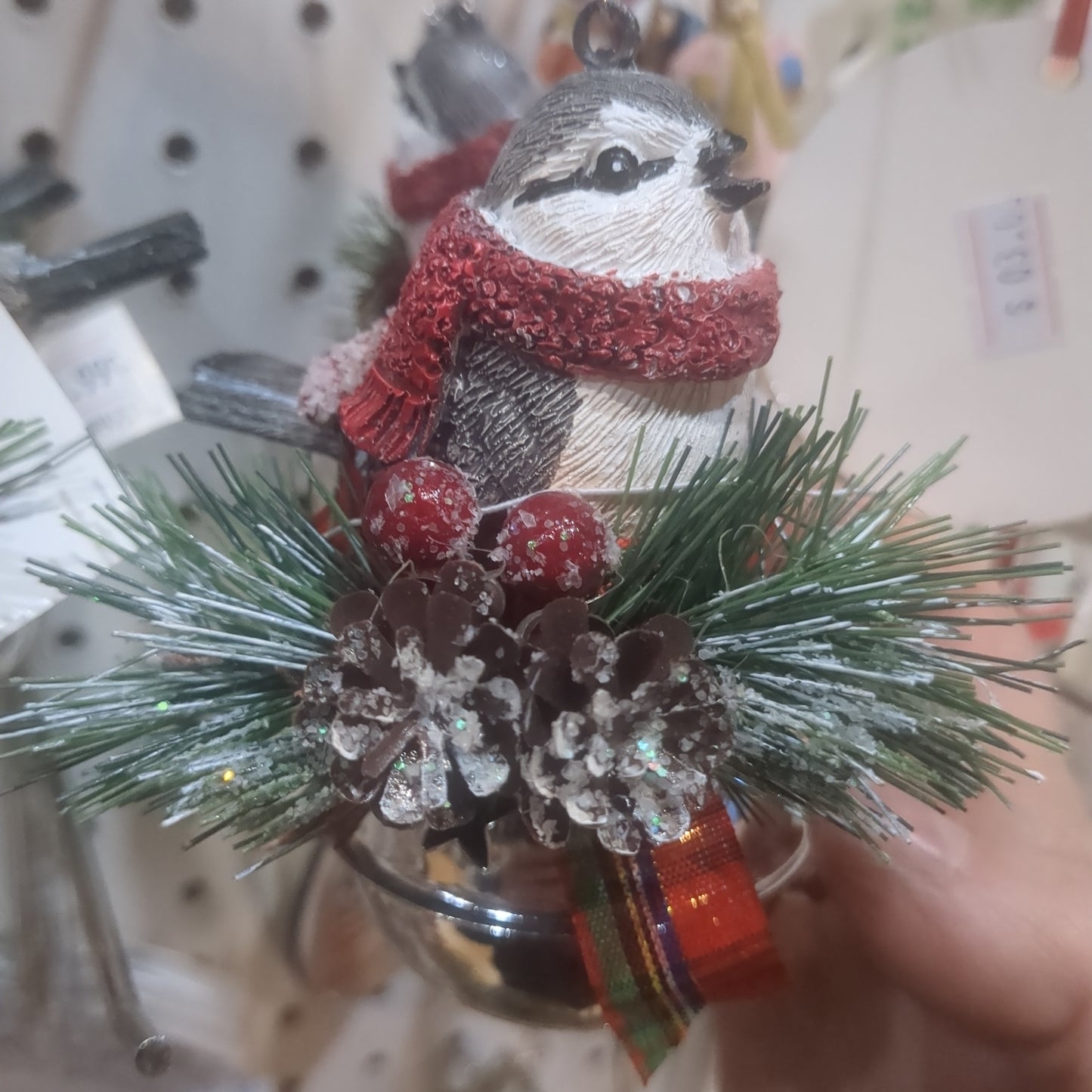 Bird on bell ornament