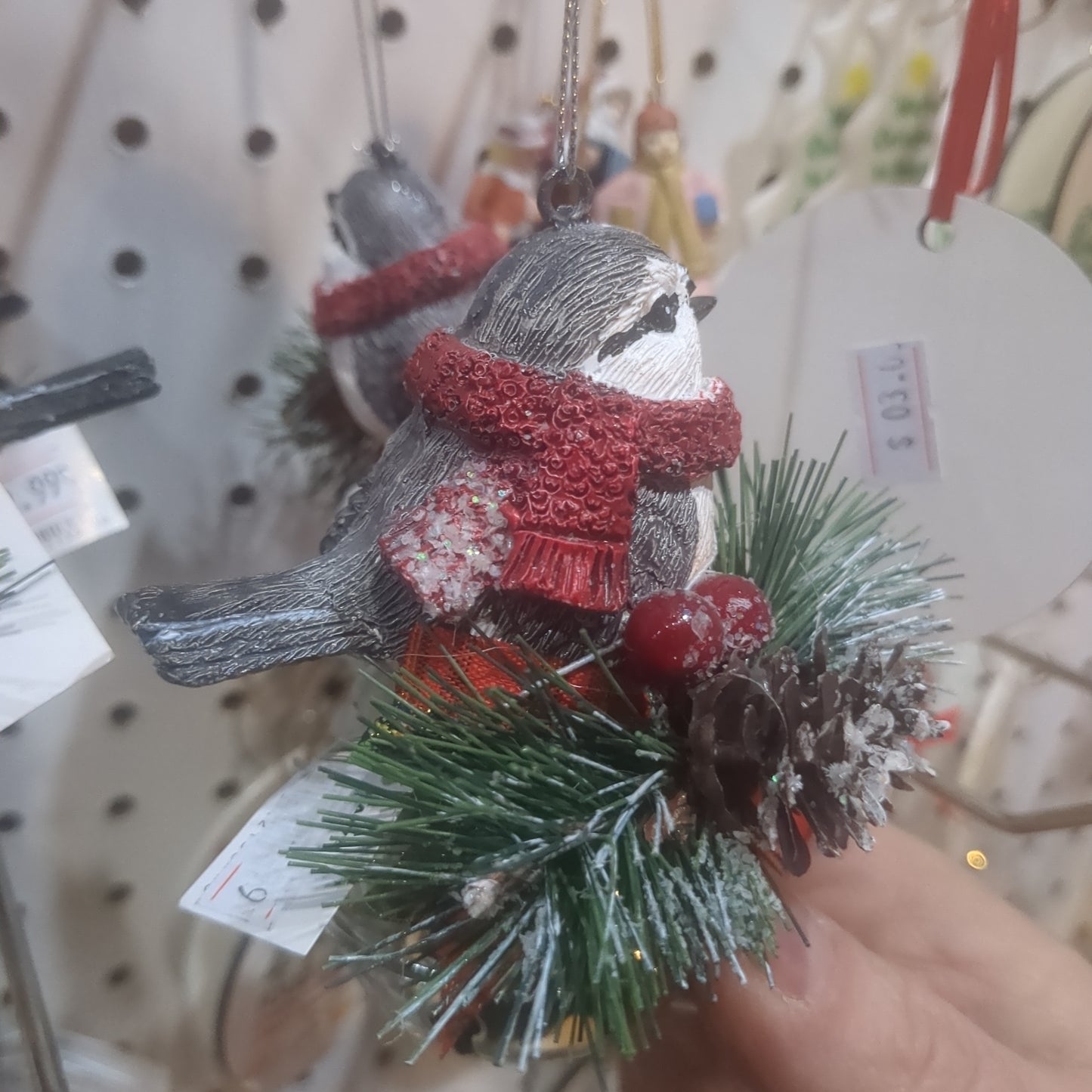Bird on bell ornament