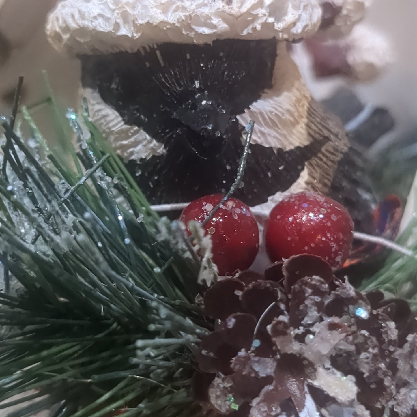 Bird on bell ornament black and tan