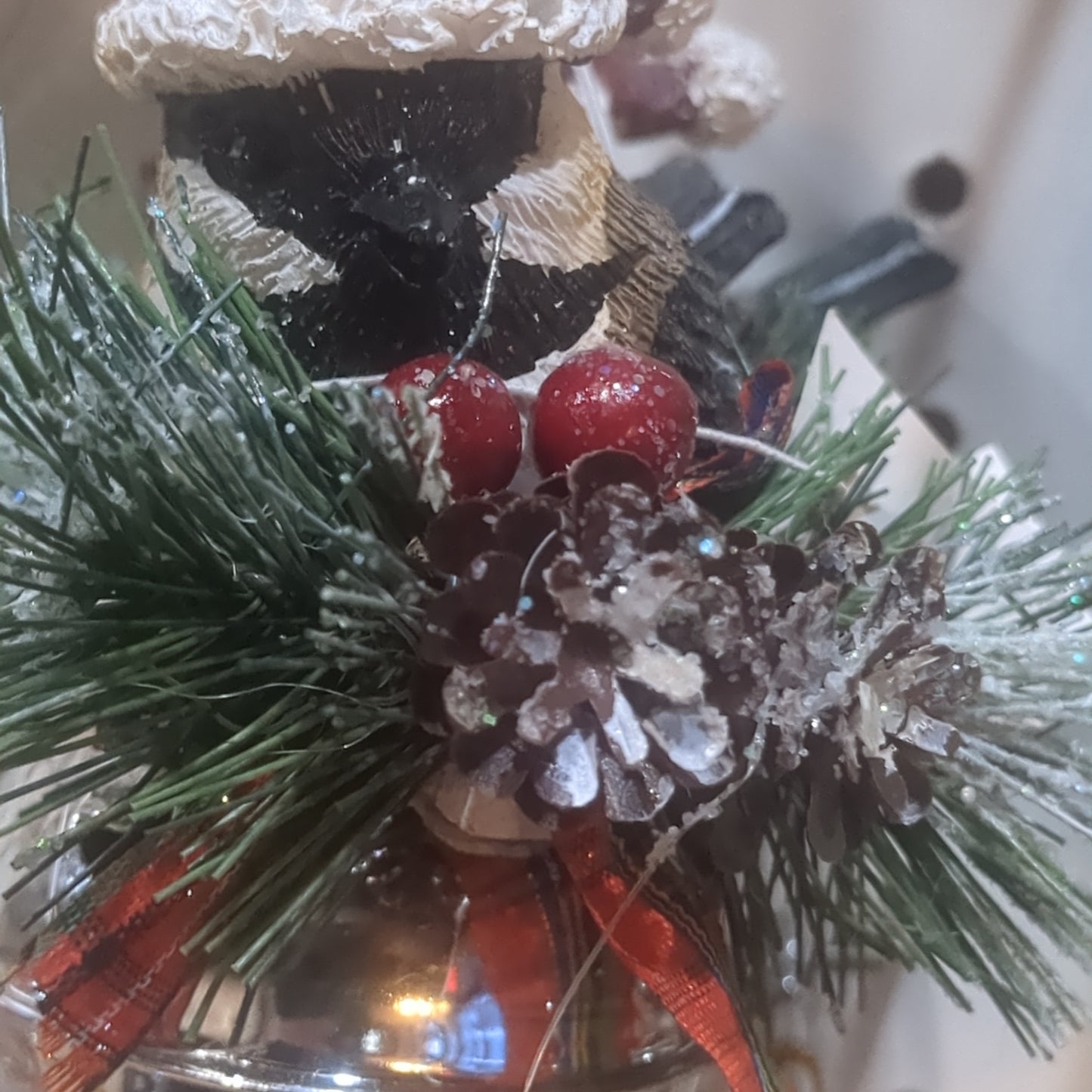 Bird on bell ornament black and tan