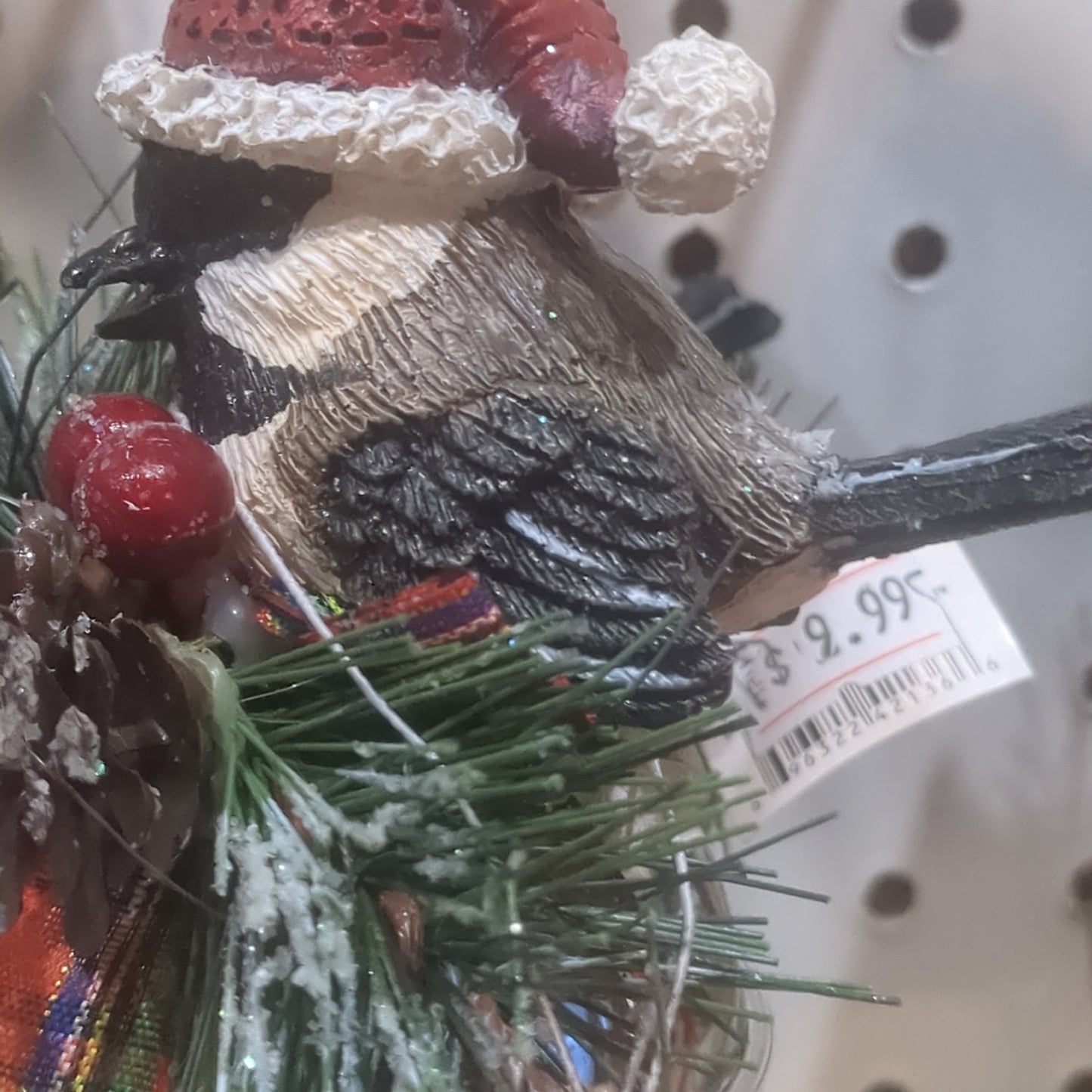 Bird on bell ornament black and tan
