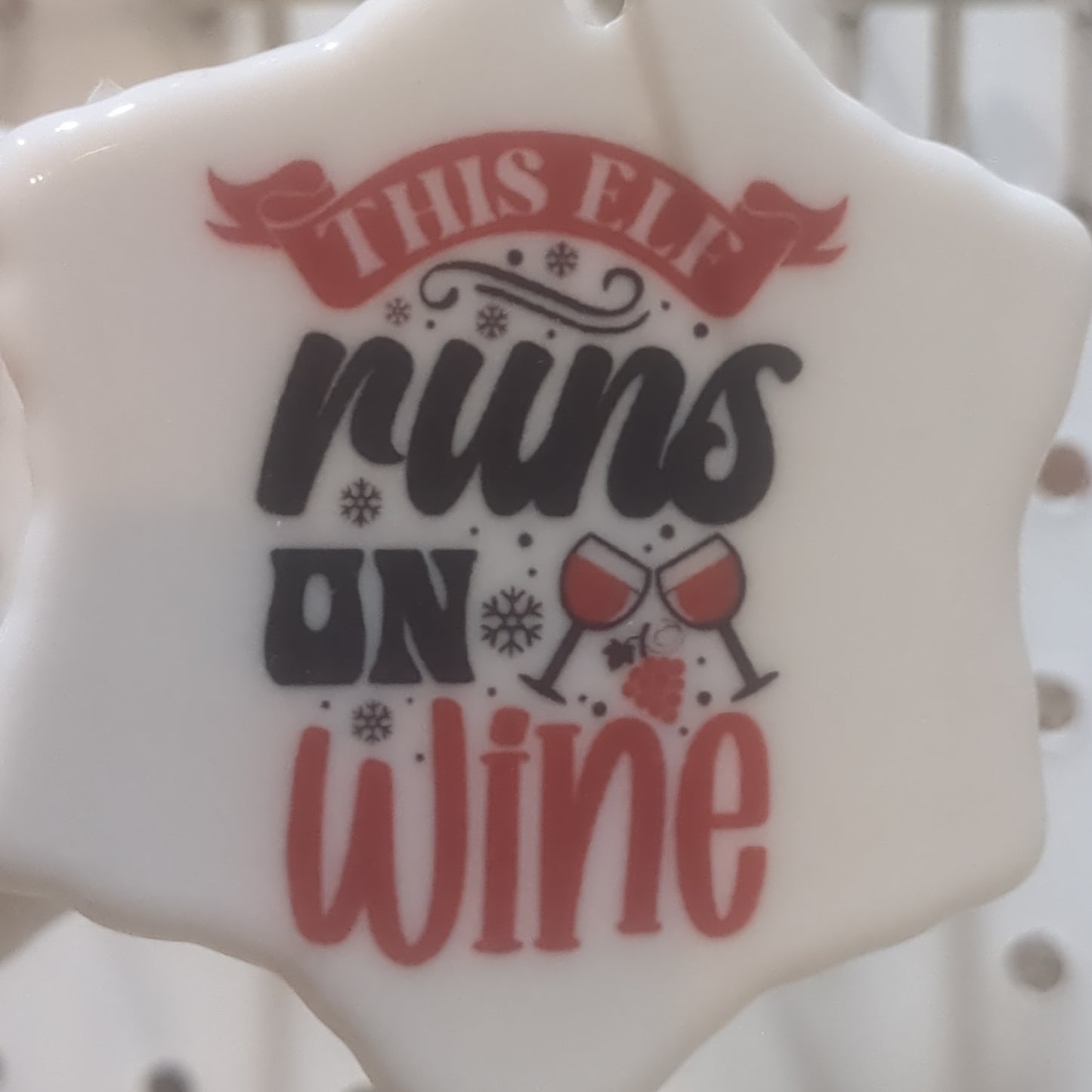 Ceramic wine ornament. This elf runs on wine.