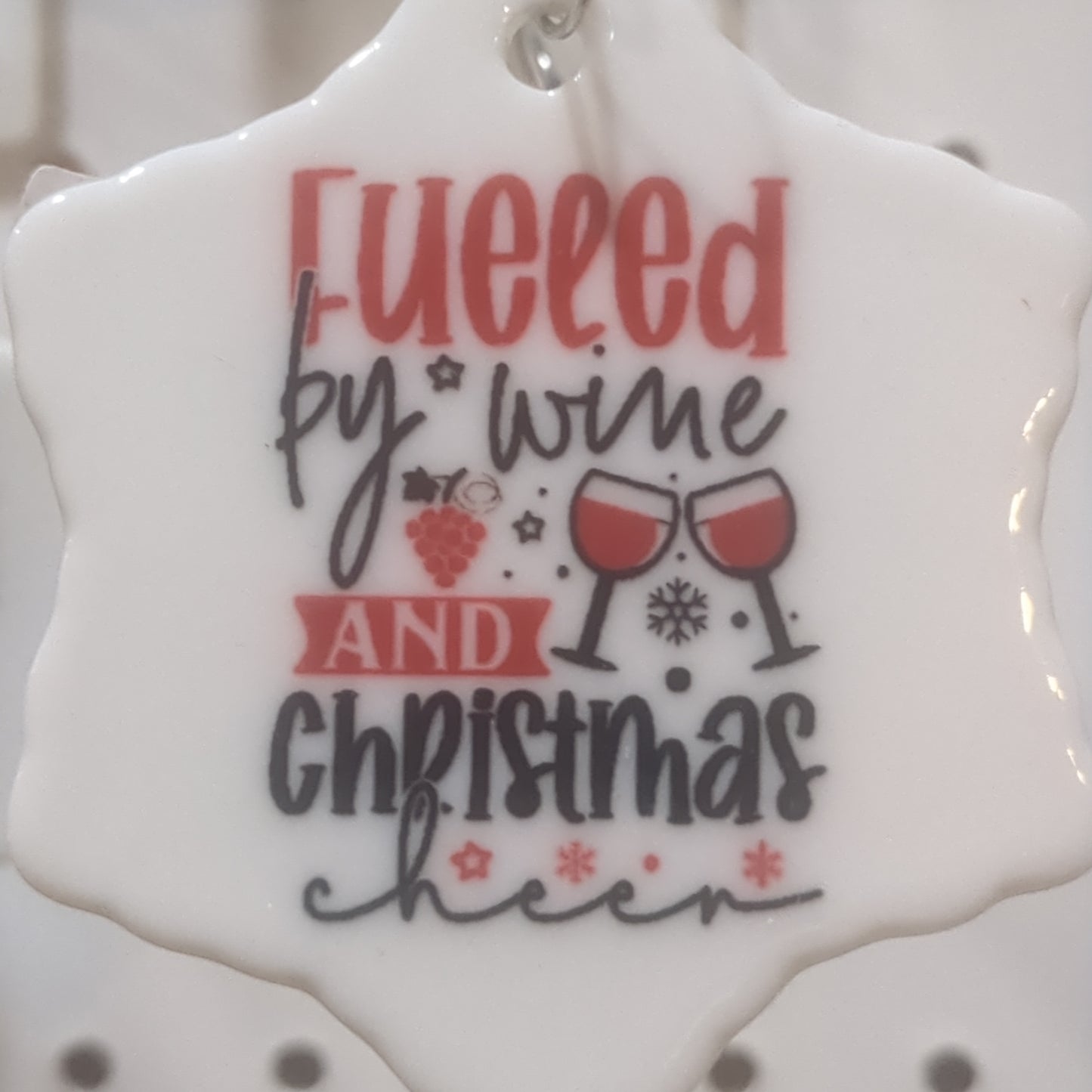 Ceramic wine ornament. Fueled by wine and Christmas cheer