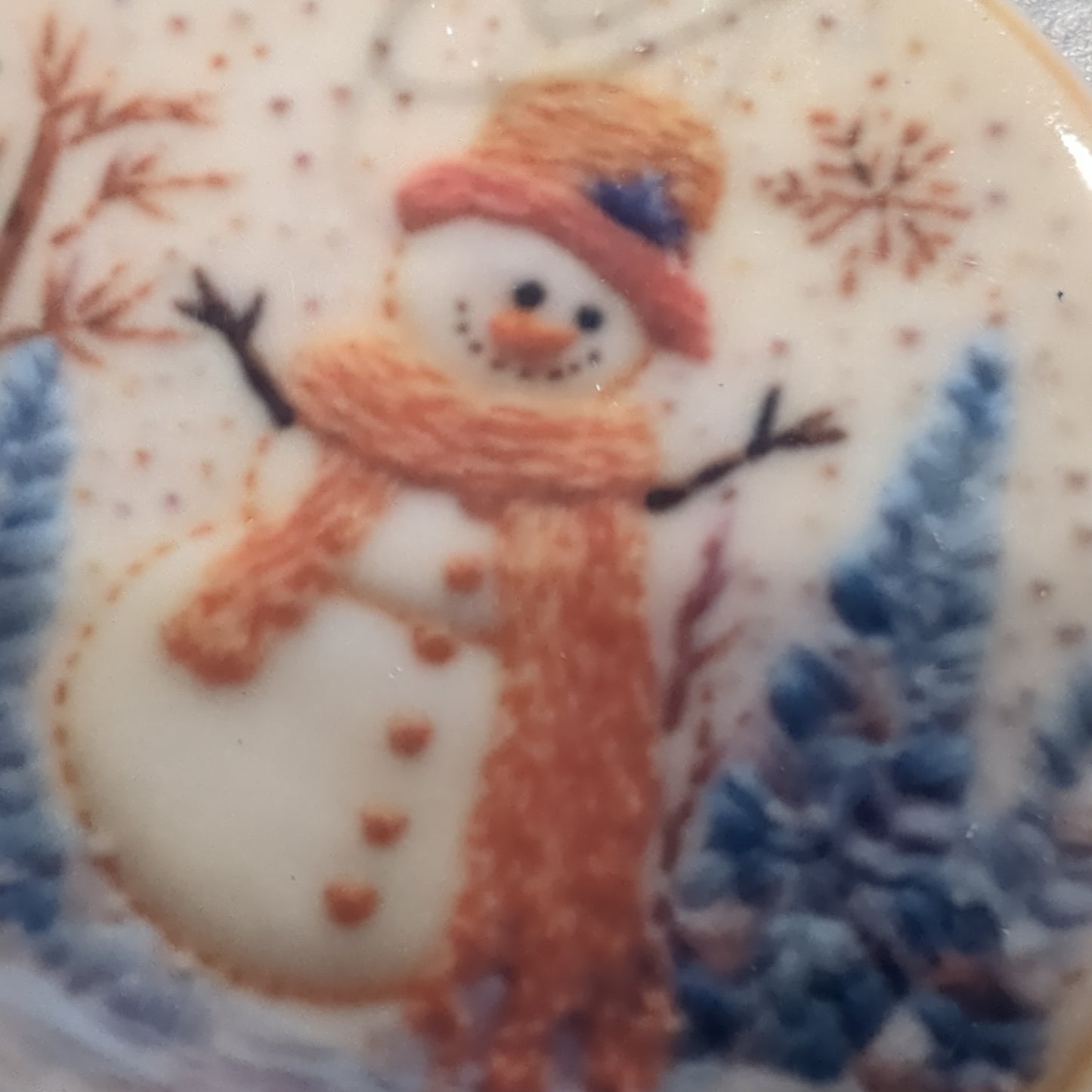 Ceramic ornament snowman with orange hat and and orange scarf