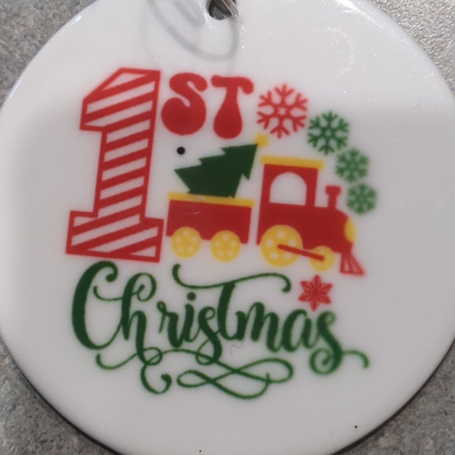 Ceramic ornament baby's first Christmas with a train