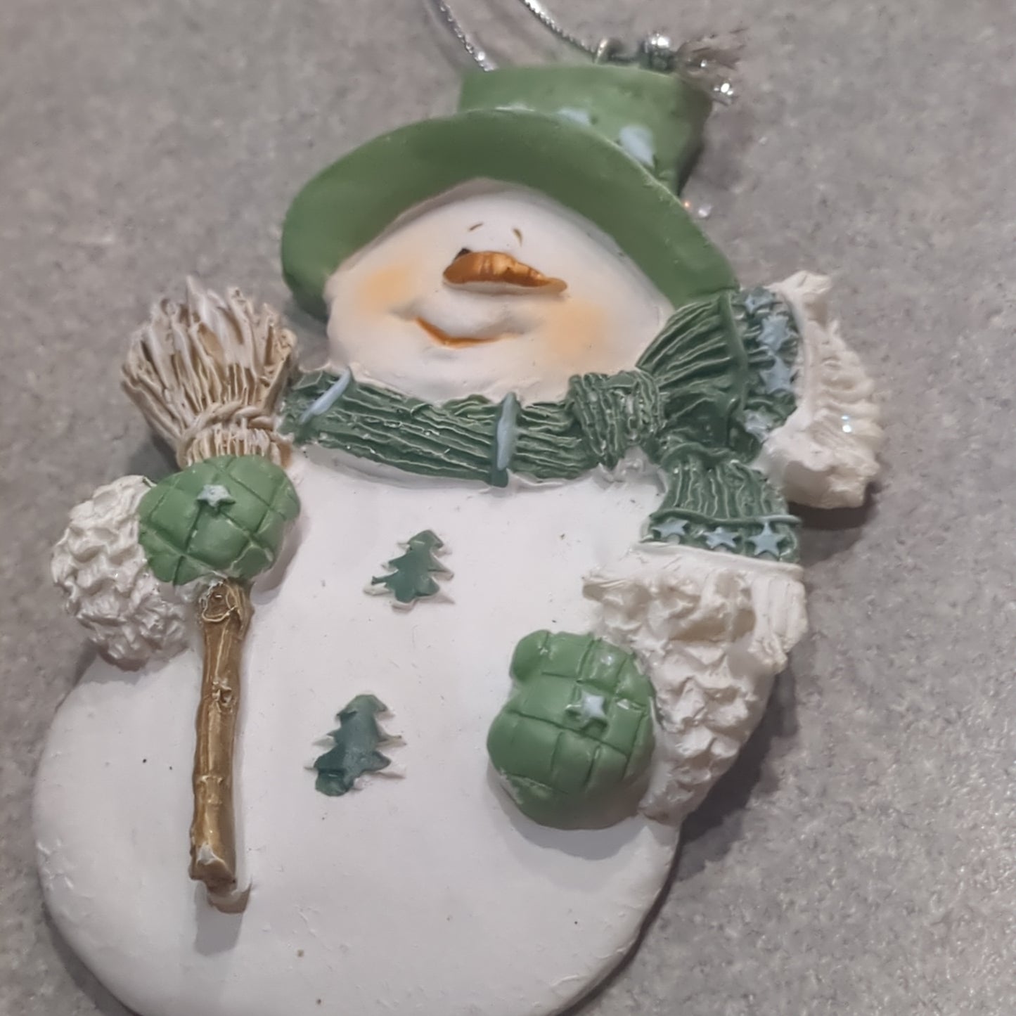 Og2 Polycrylic snowman ornament with a broom - green