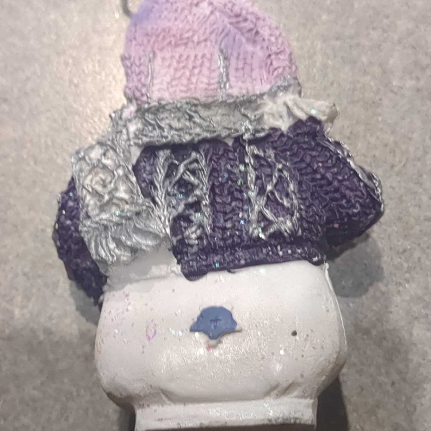 Op2 Polycrylic snowman ornament with an ice skate lilac and purple