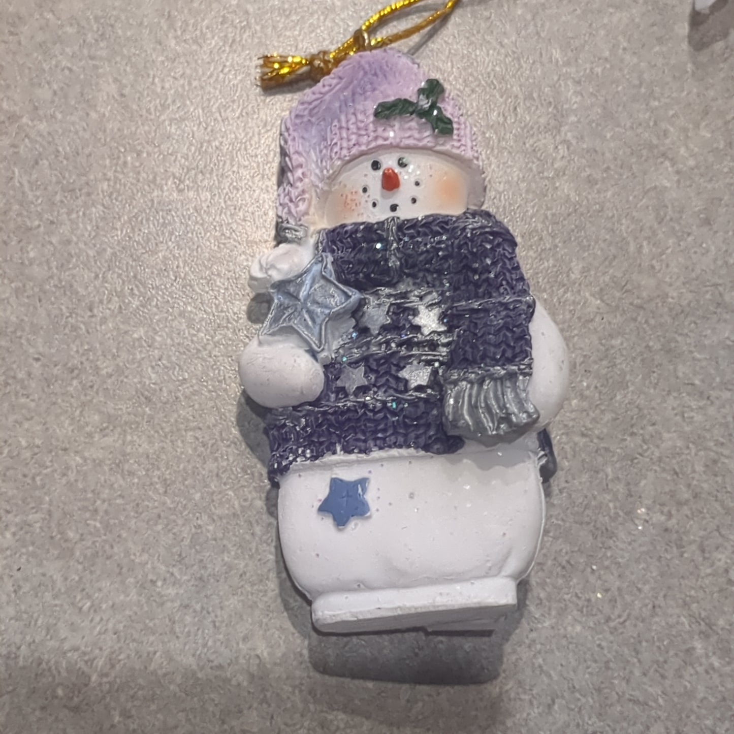 Op1 Polycrylic snowman ornament with a star lilac and purple