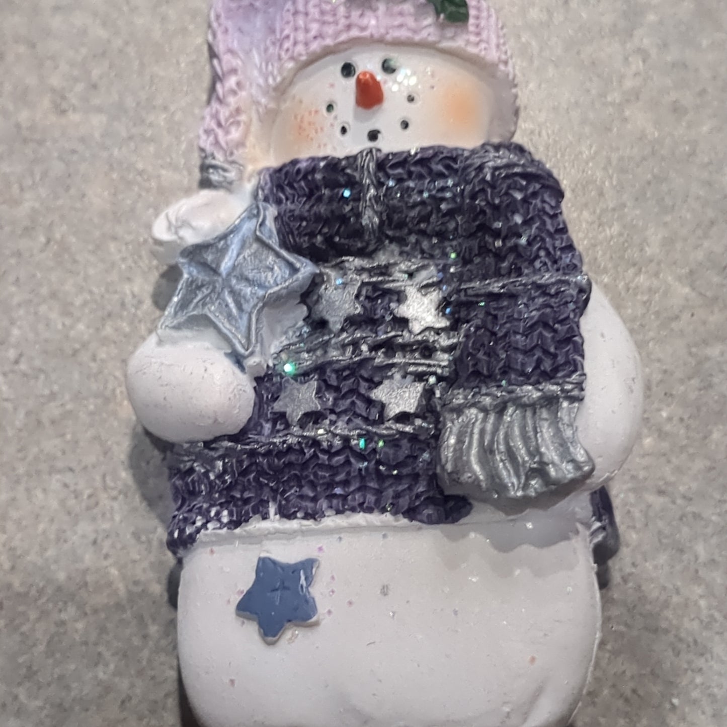 Op1 Polycrylic snowman ornament with a star lilac and purple