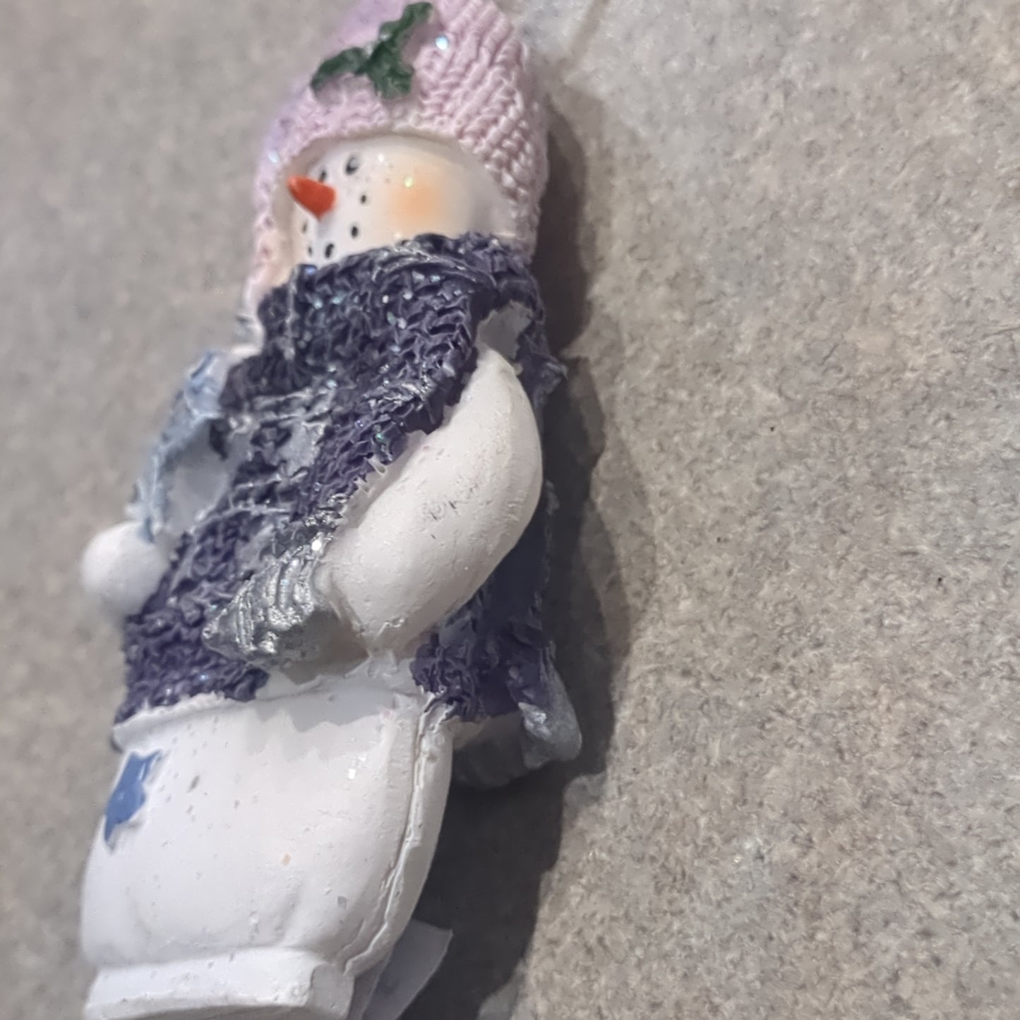 Op1 Polycrylic snowman ornament with a star lilac and purple