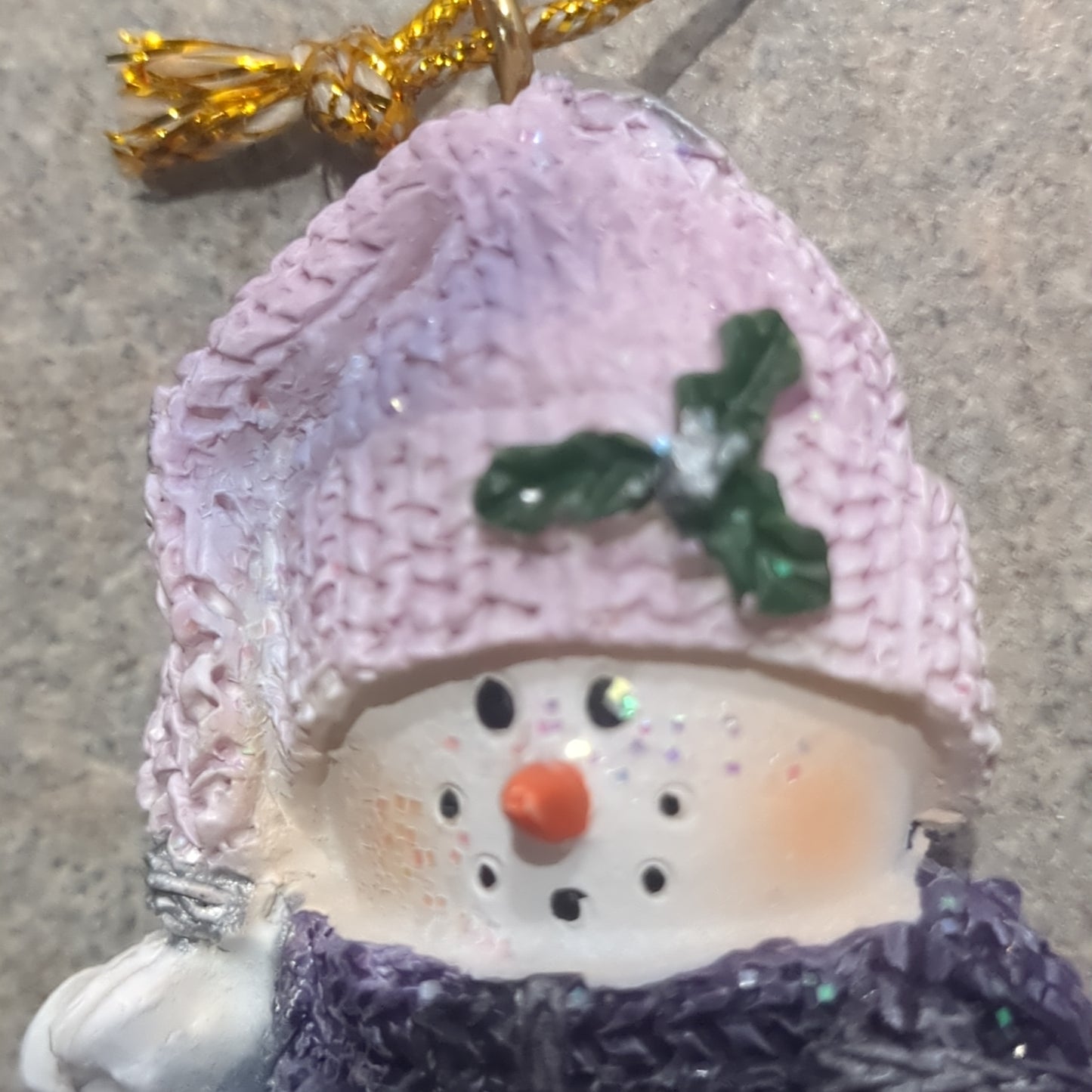 Op1 Polycrylic snowman ornament with a star lilac and purple