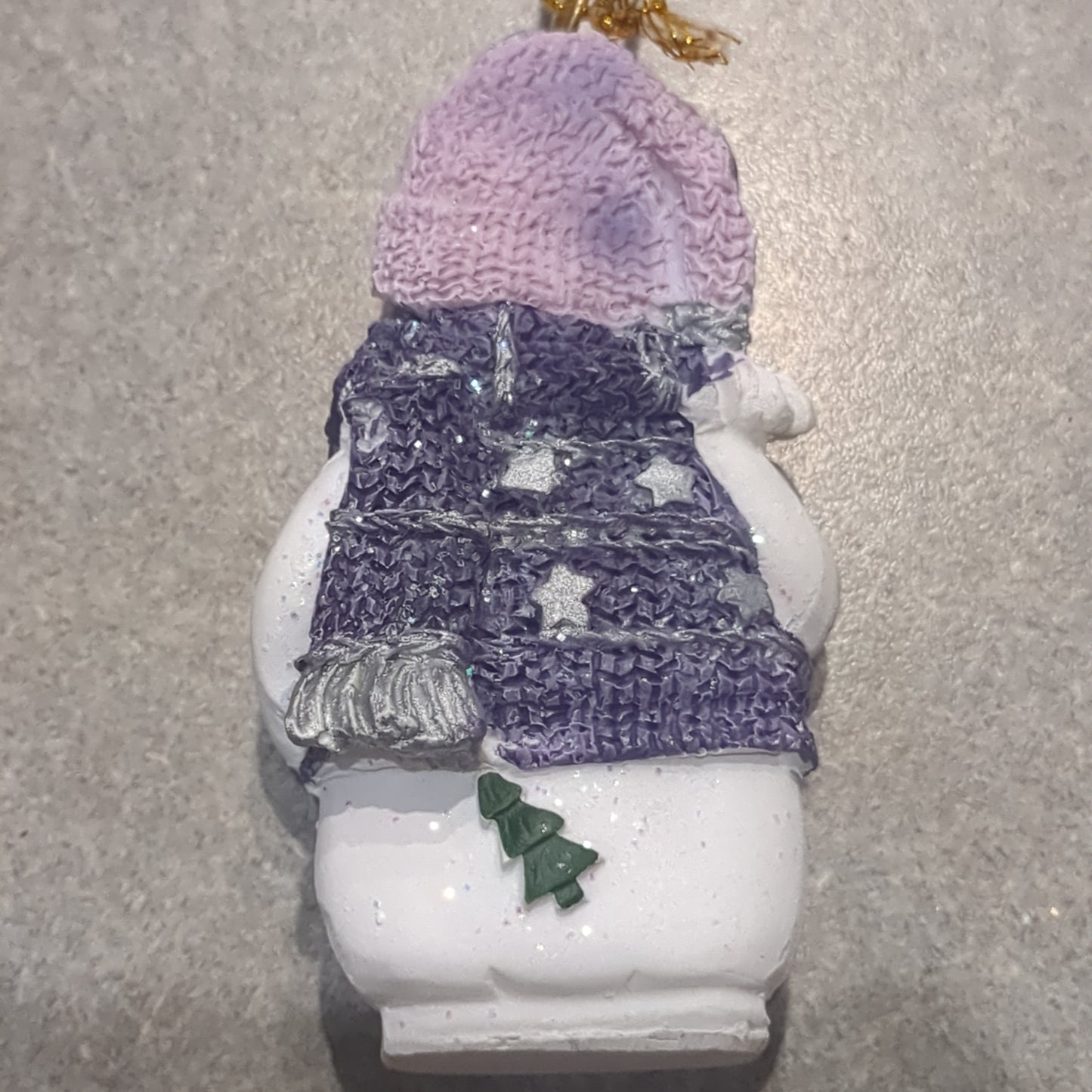 Op1 Polycrylic snowman ornament with a star lilac and purple