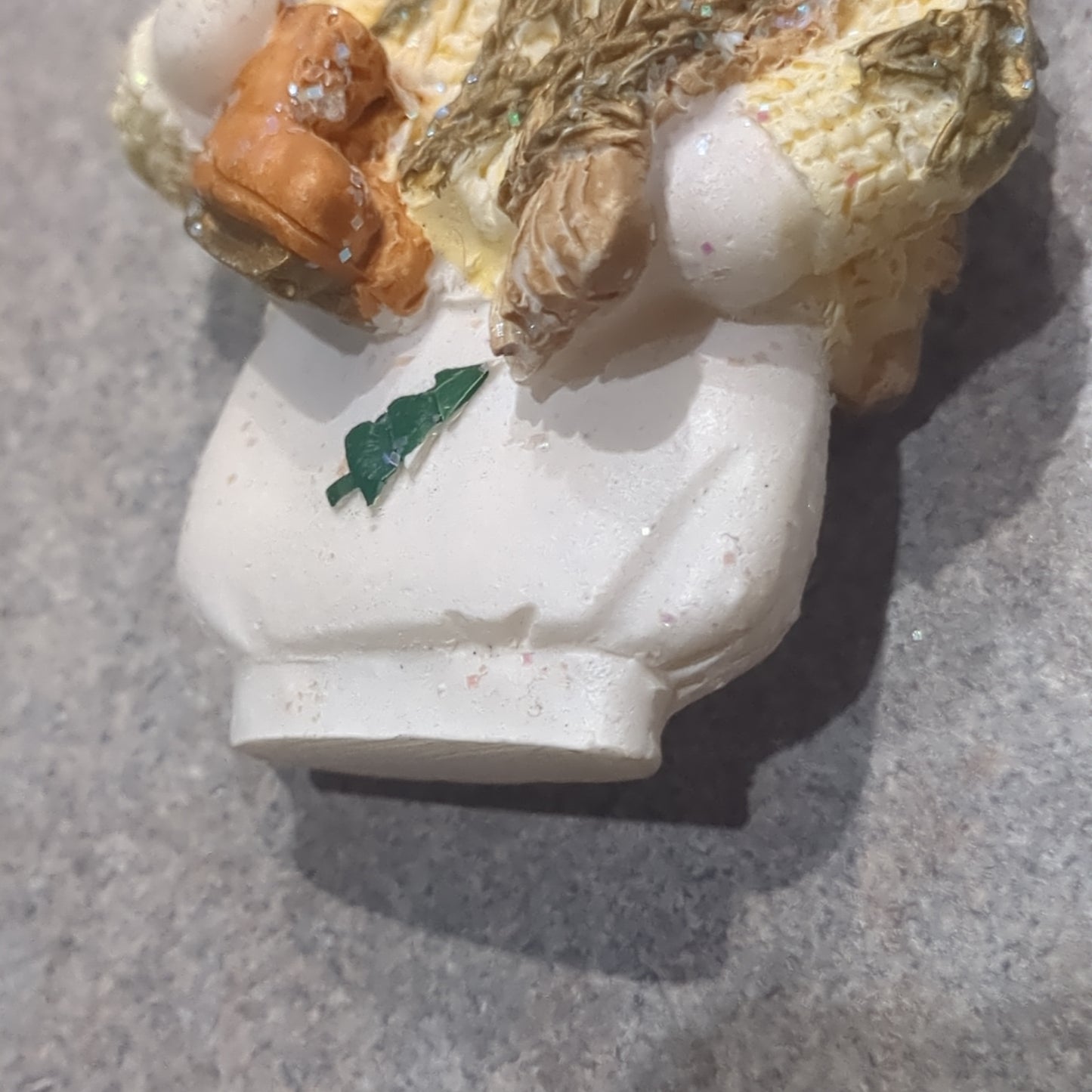 Oy5 Polycrylic snowman ornament with an ice skate yellow