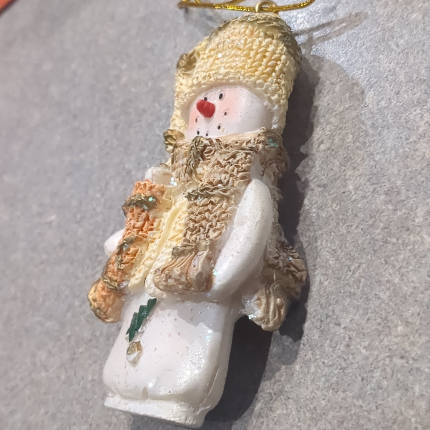 Oy2 Polycrylic snowman ornament with stocking yellow