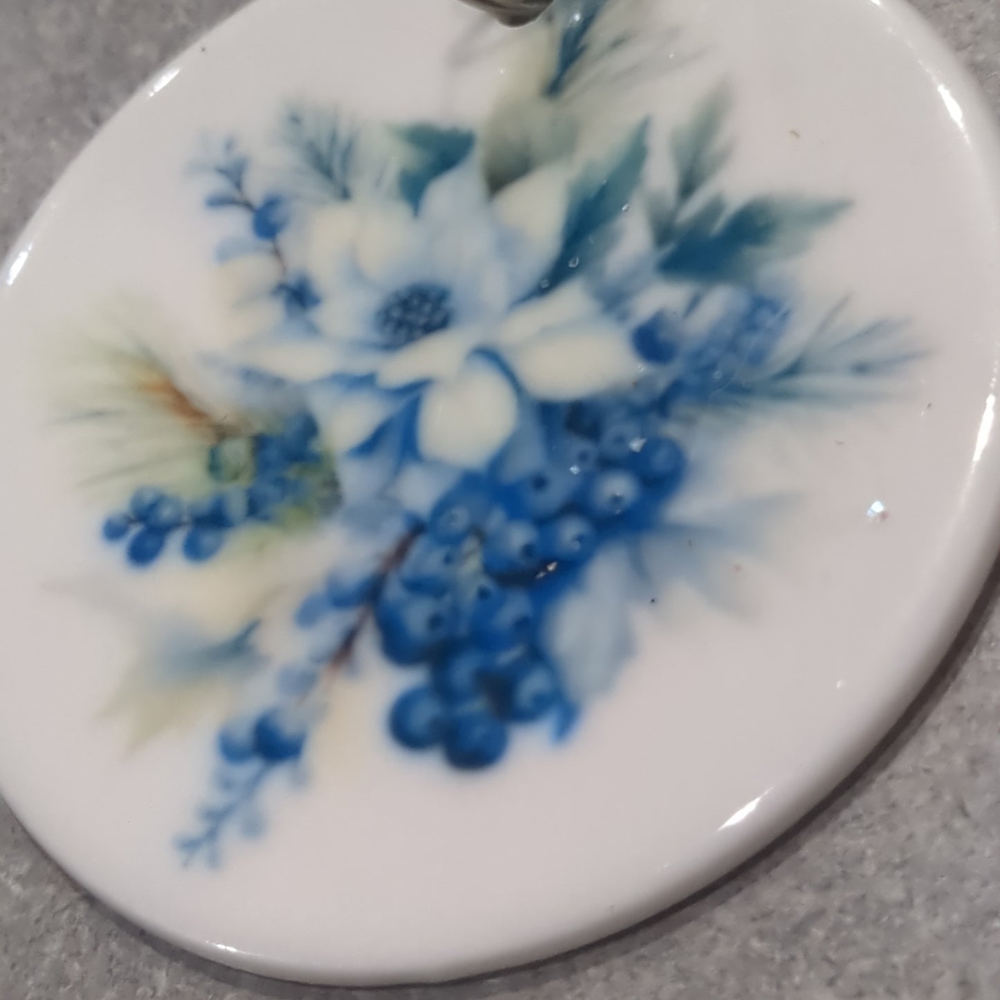 Ceramic ornament flowers and blue berries