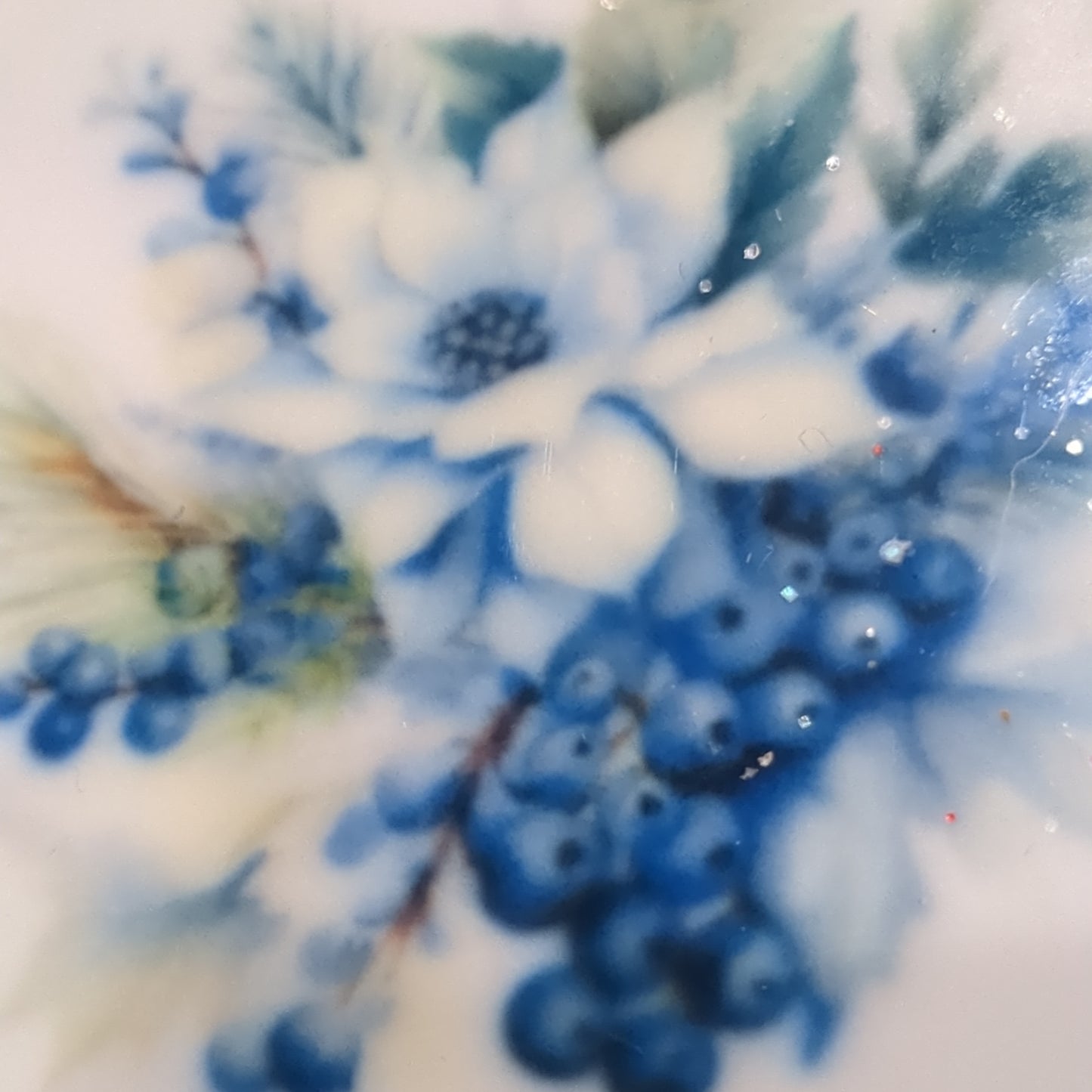 Ceramic ornament flowers and blue berries