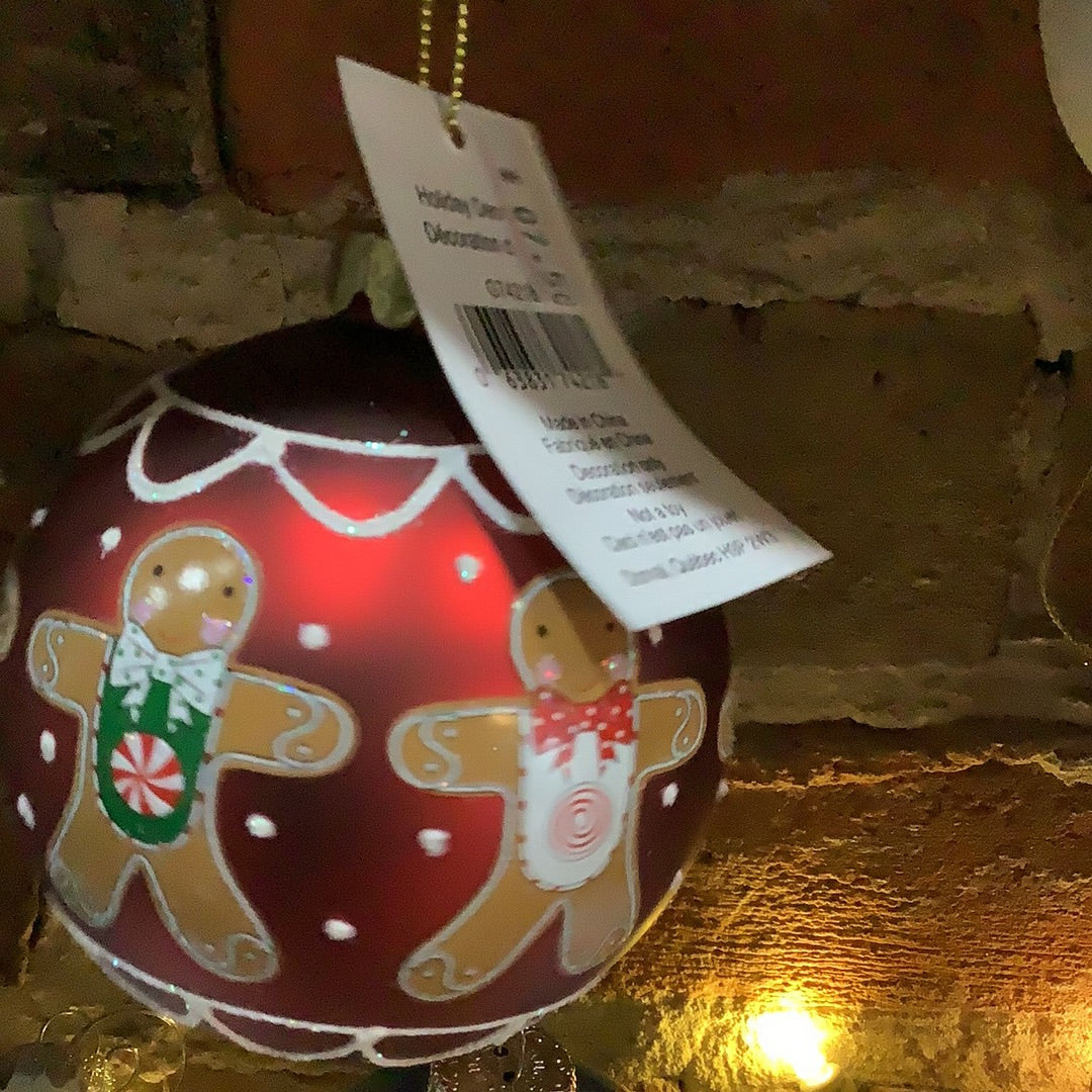 Glass ball ornament with gingerbread, 3 inches
