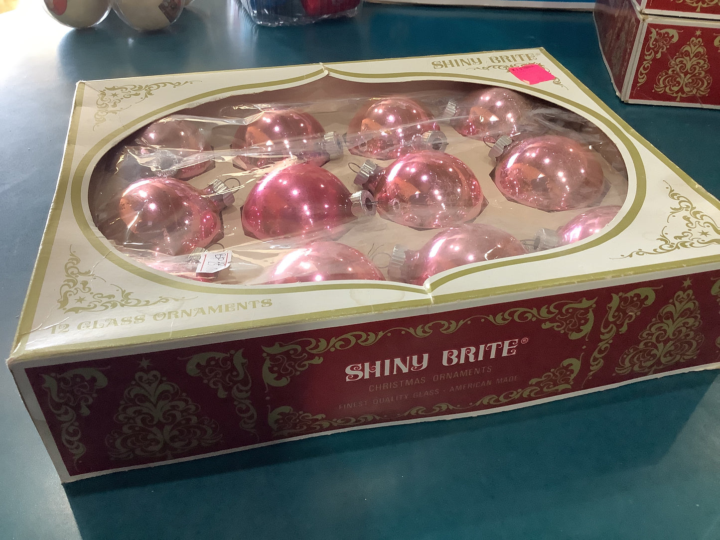 Bo10 box of shiny bright pink ornaments 2 1/4"