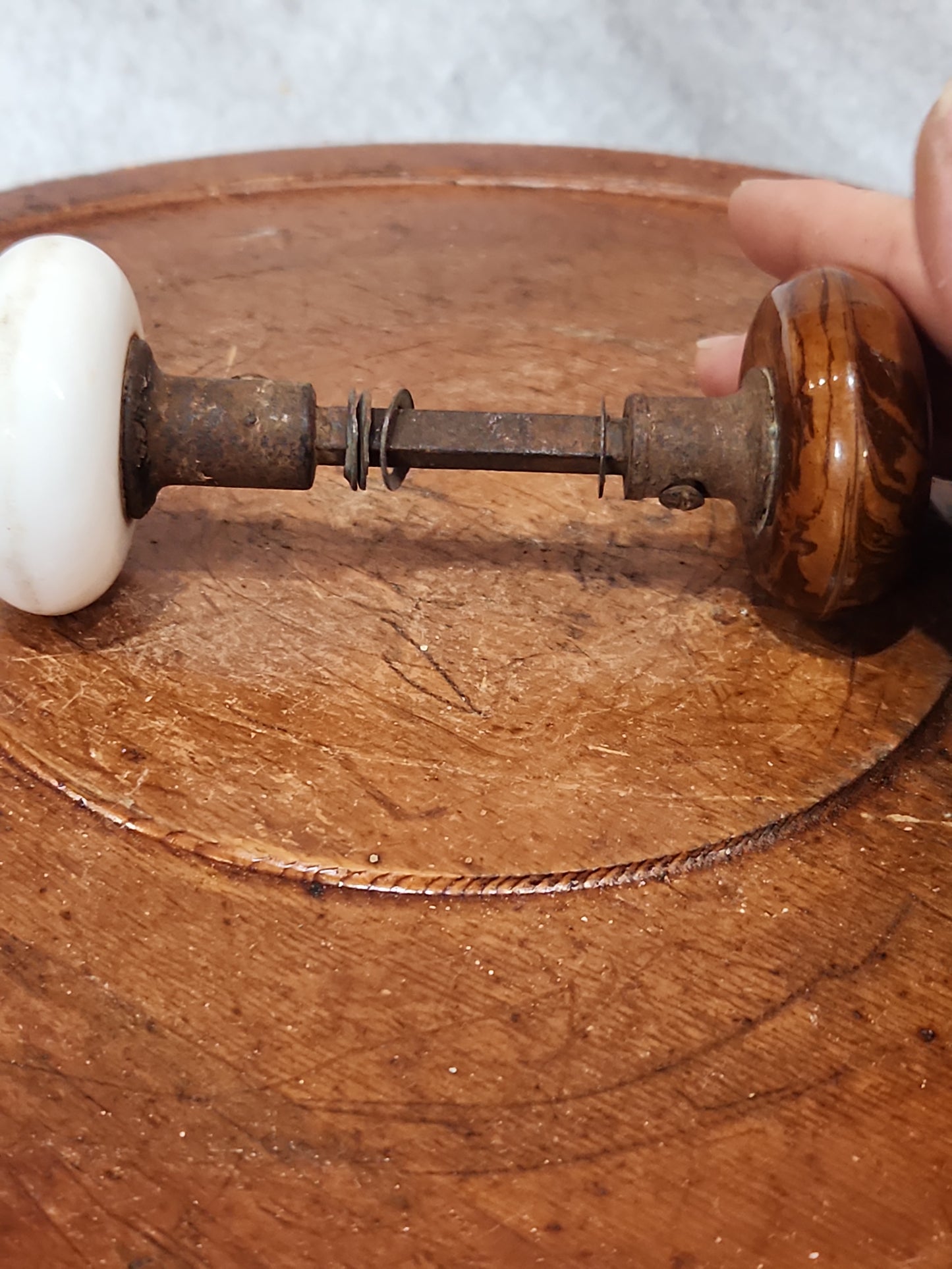 Antique UNMATCHING Porcelain Brown Marble or Swirl Door Knobs attached to a stem kn20