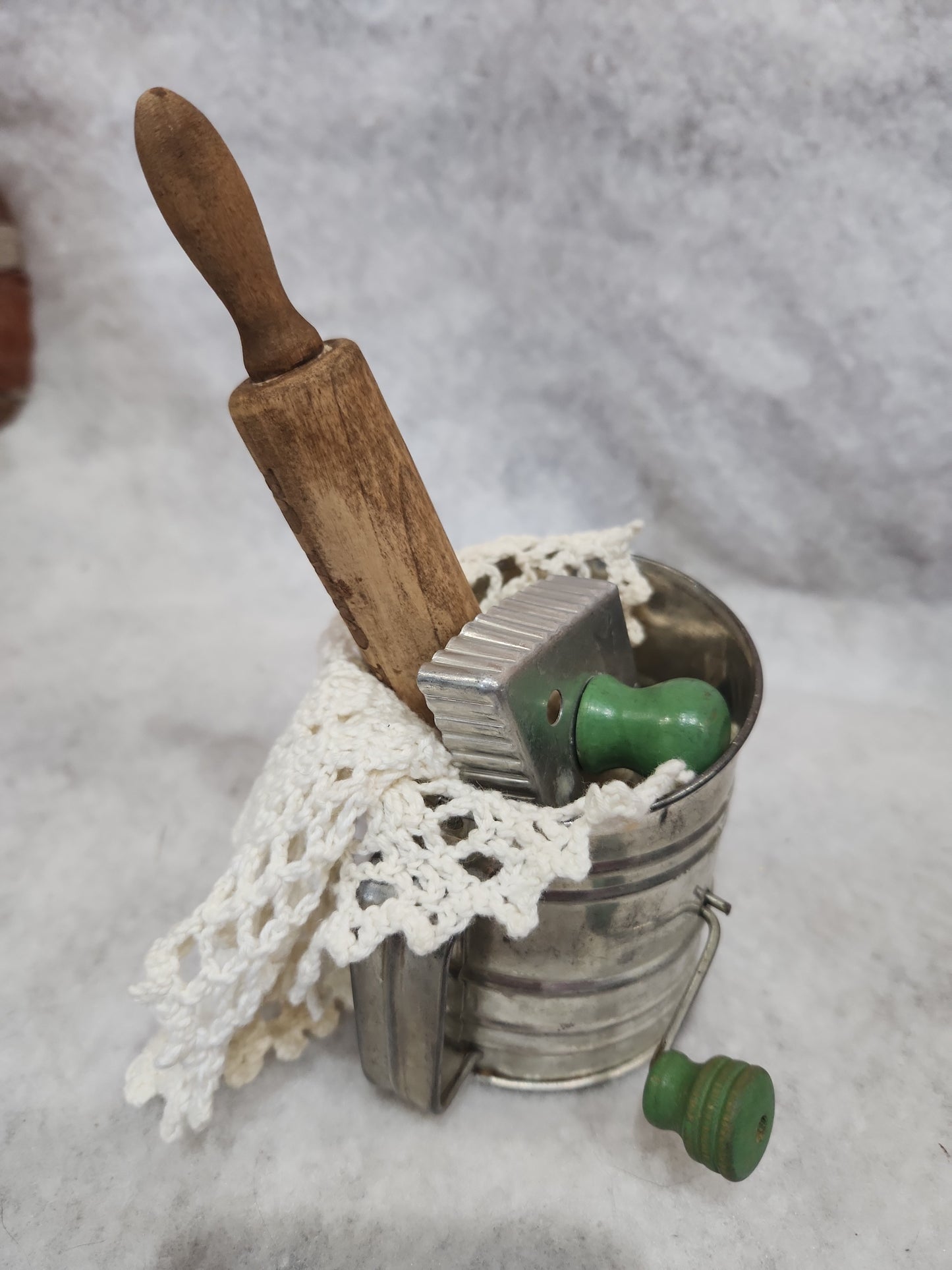 Flour sifter, rolling pin, doily, cookie cutter assemblage asb21