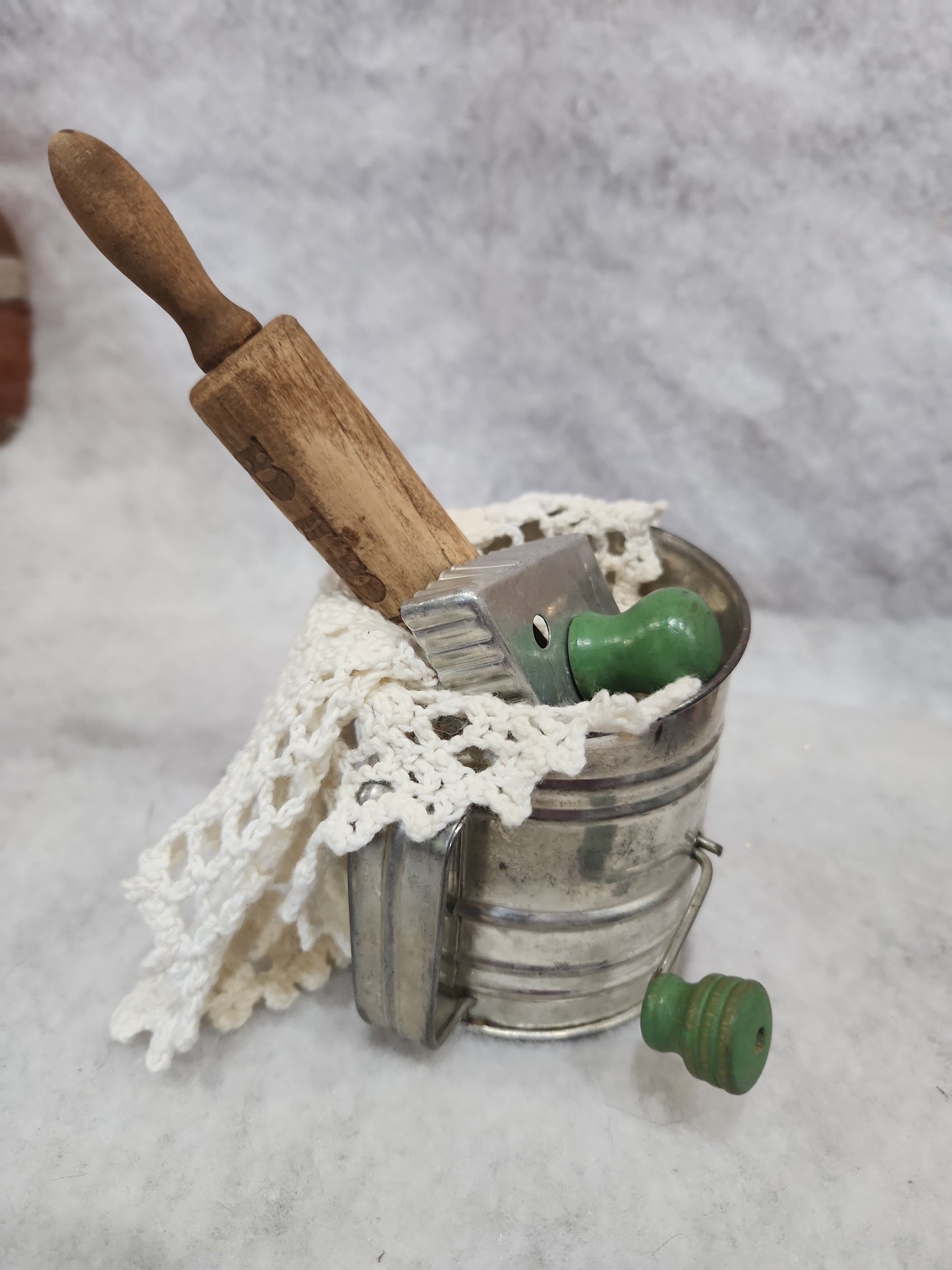 Flour sifter, rolling pin, doily, cookie cutter assemblage asb21