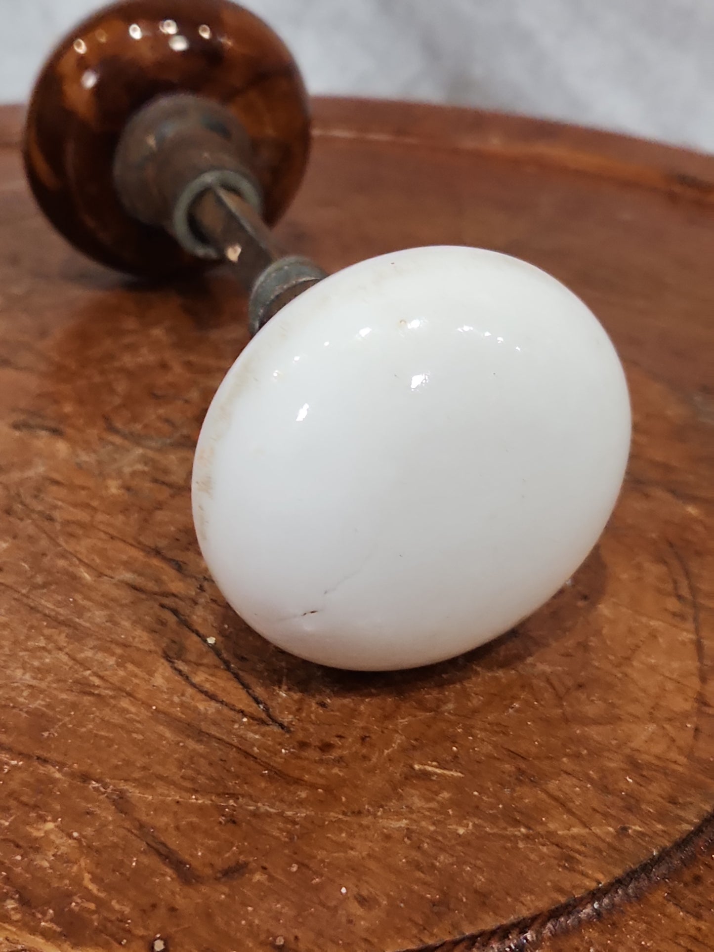 Antique UNMATCHING Porcelain Brown Marble or Swirl Door Knobs attached to a stem kn20