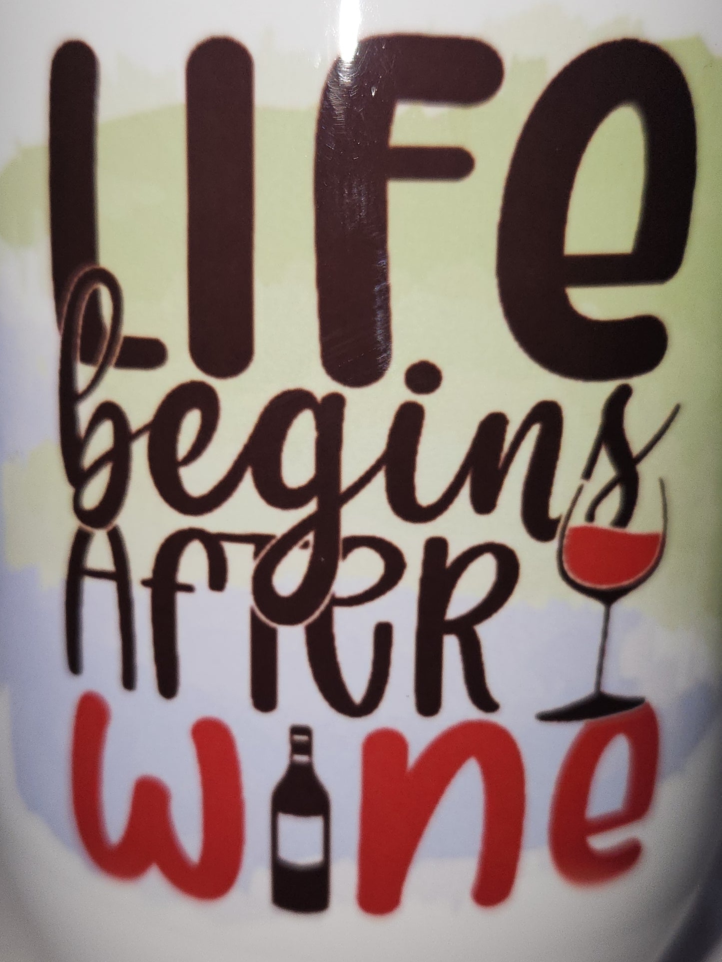 12 Oz stainless steel wine tumbler. It says life begins after wine wt3