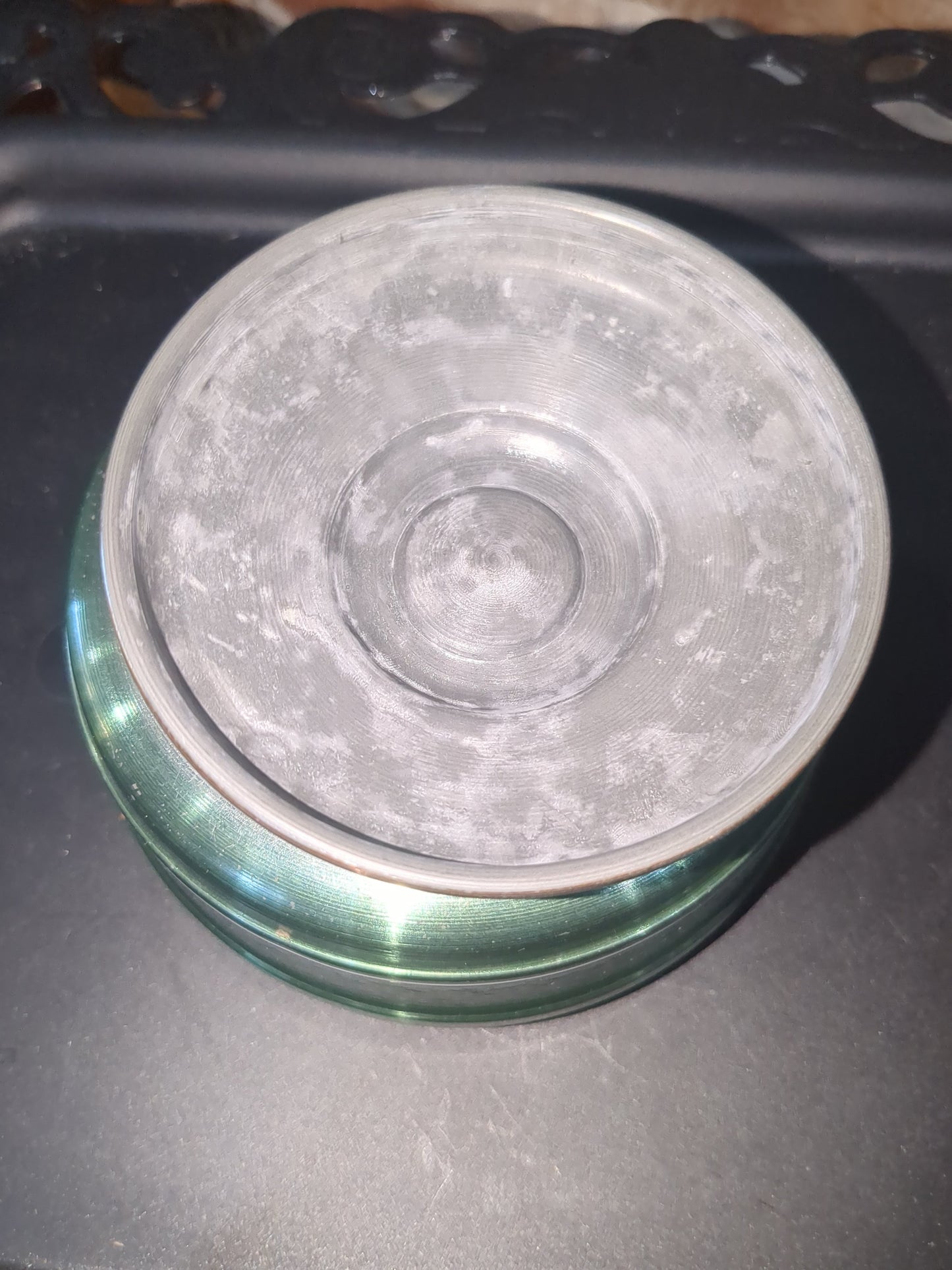 Vintage, round, aluminum, powder puff music box with faux pearls on top. Mb1