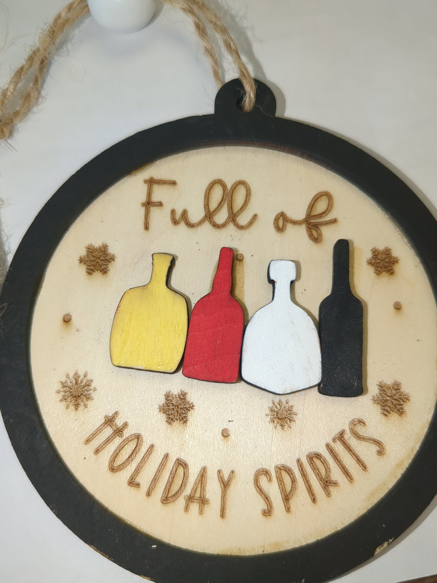 Wooden ornament or car charm. Full of holiday spirits.
