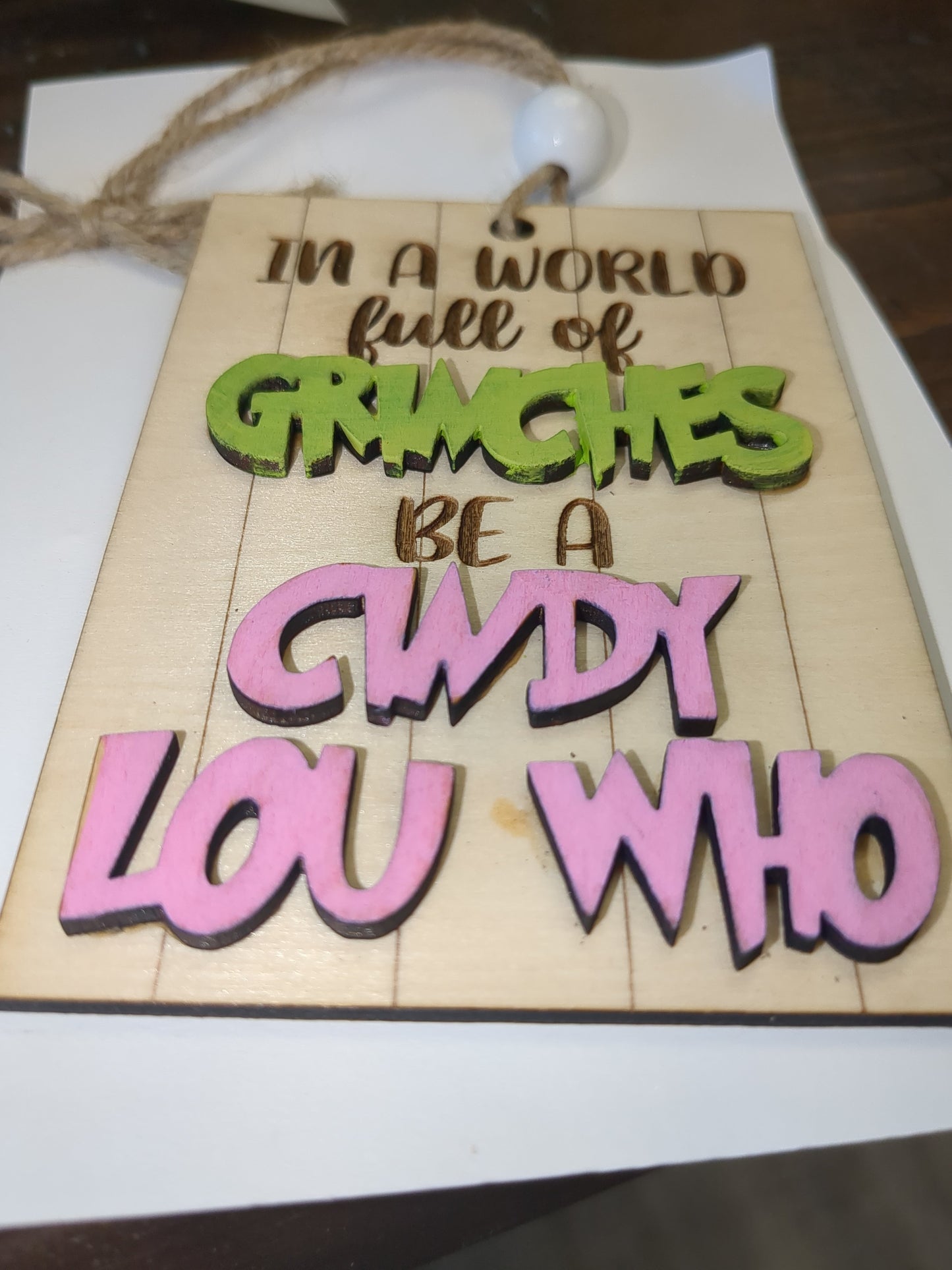 Ornament or car charm In a world of Grinches be a Cindy Lou Who