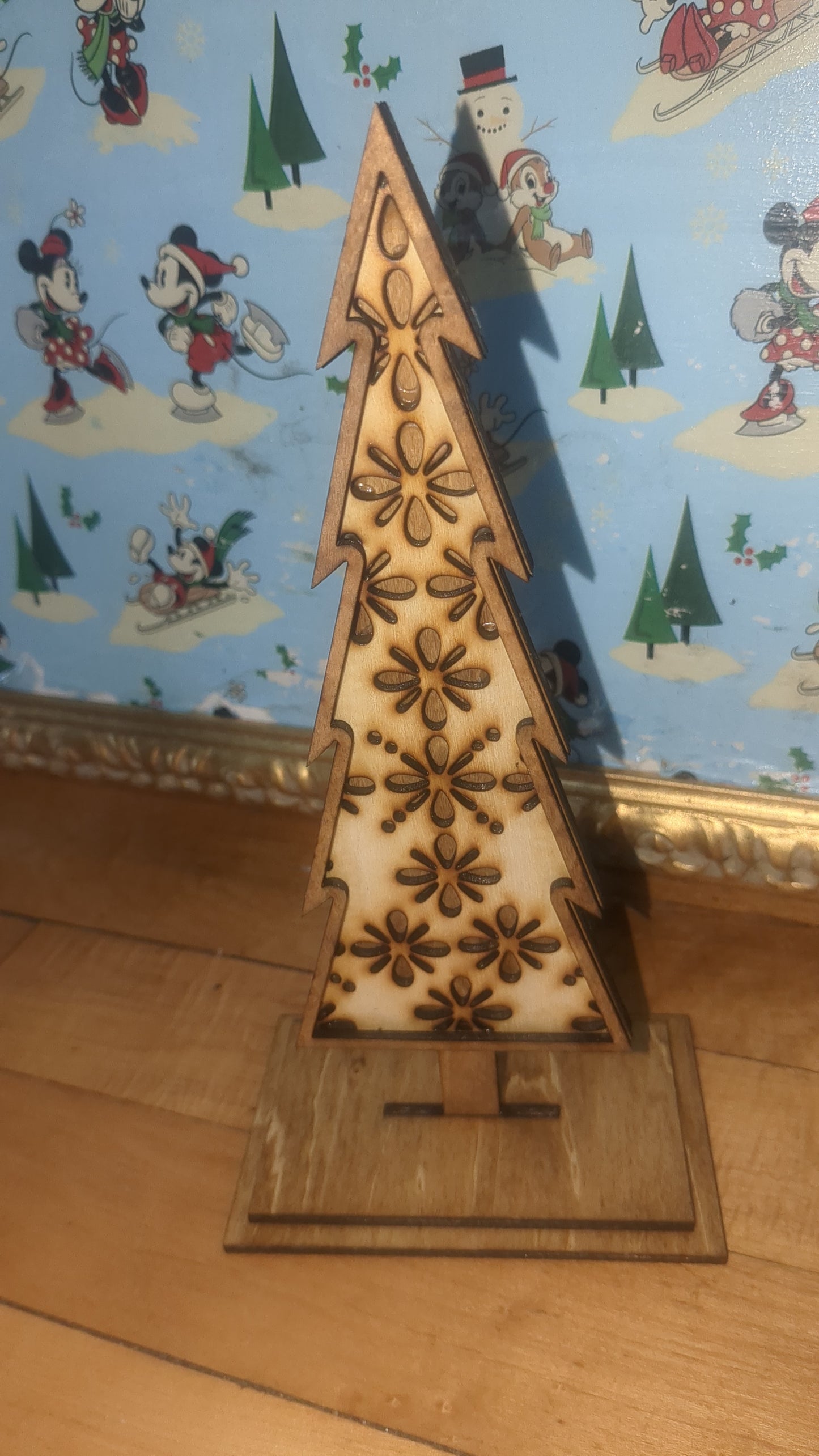 Standing wooden patterned layered trees. Unique decor pieces sold as a set.