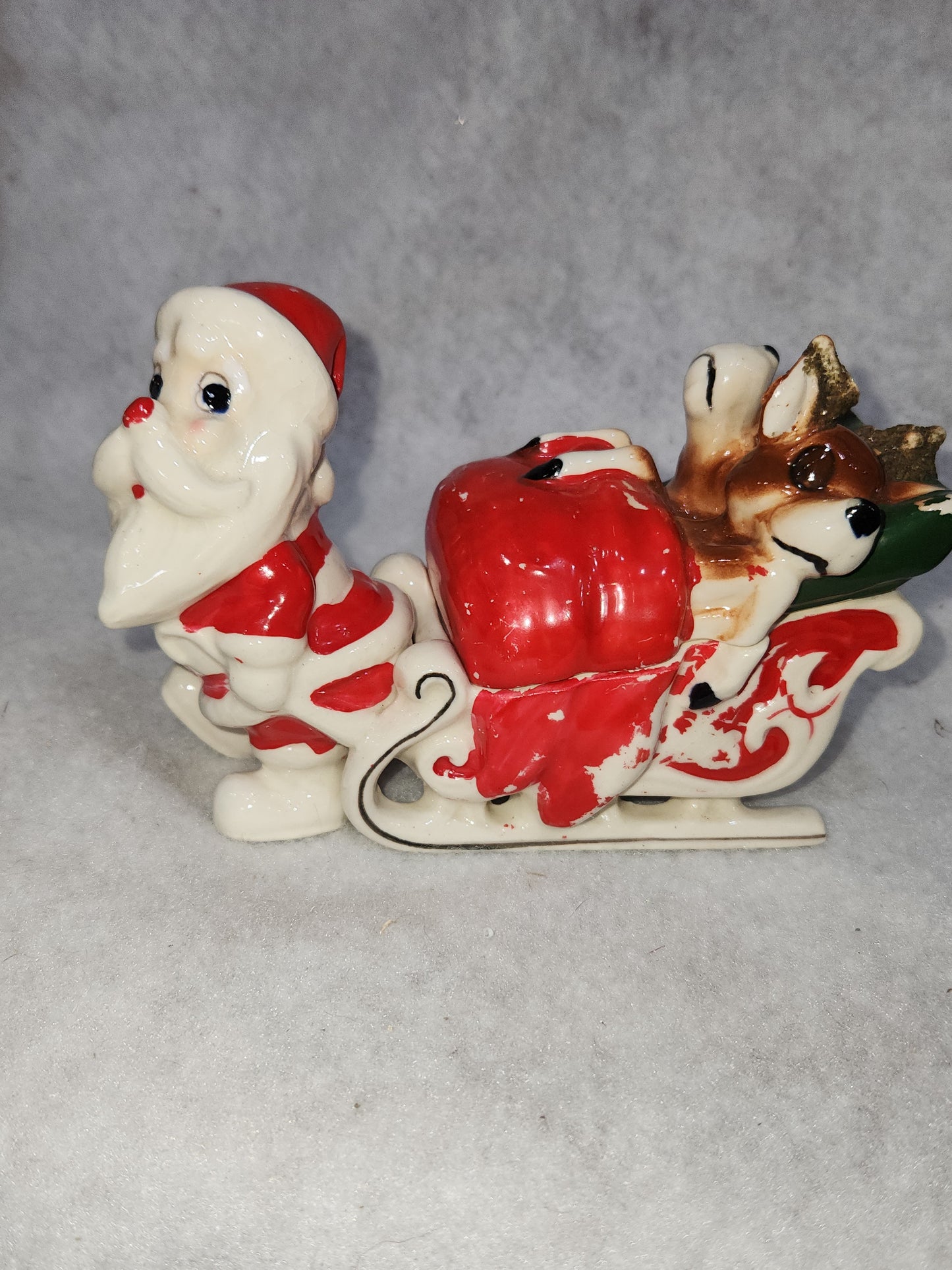 Vintage Kreiss Santa Pulling His Sleigh While his Reindeer are Snoozing inside Sleigh planter candy dish