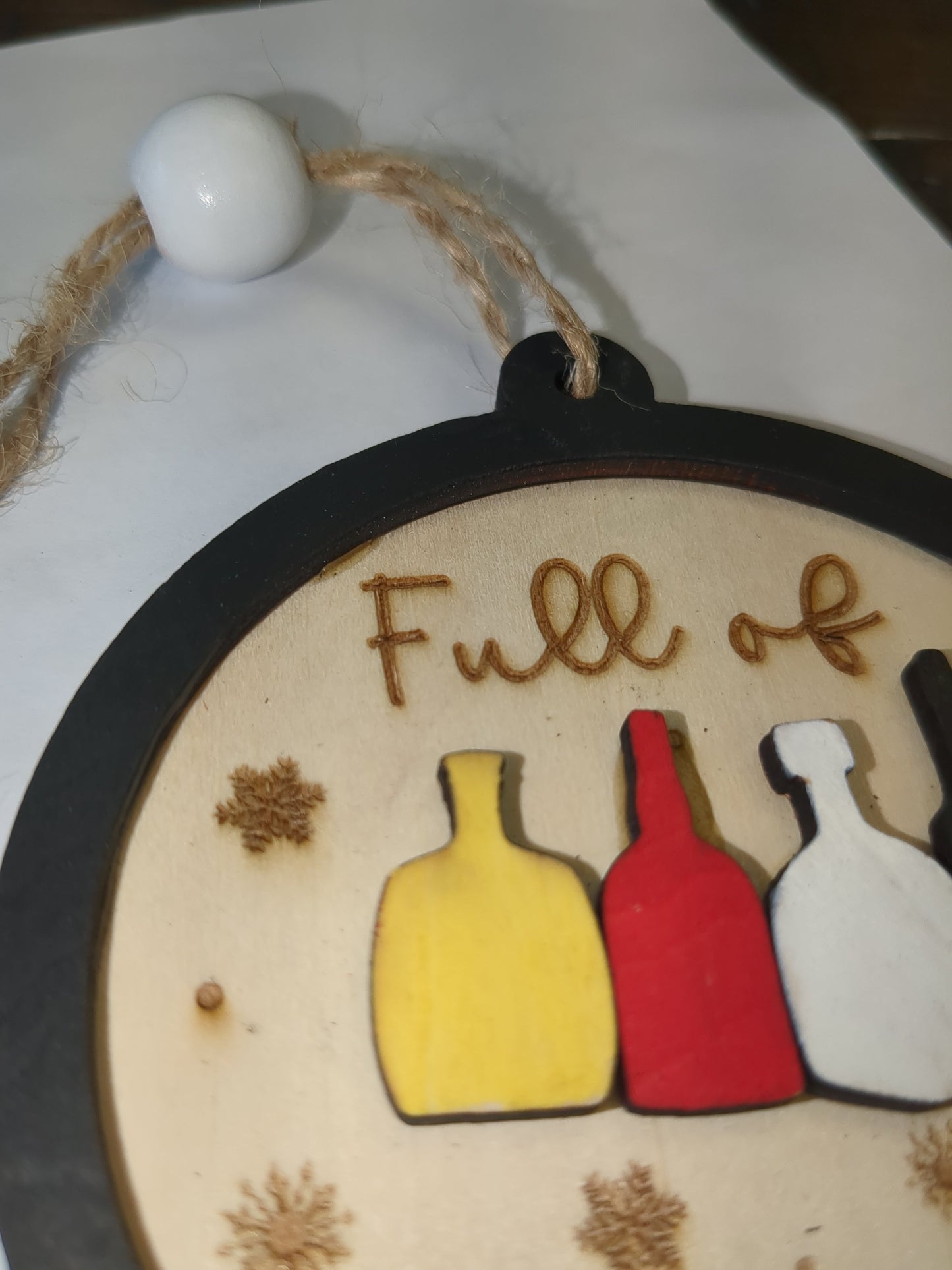 Wooden ornament or car charm. Full of holiday spirits.