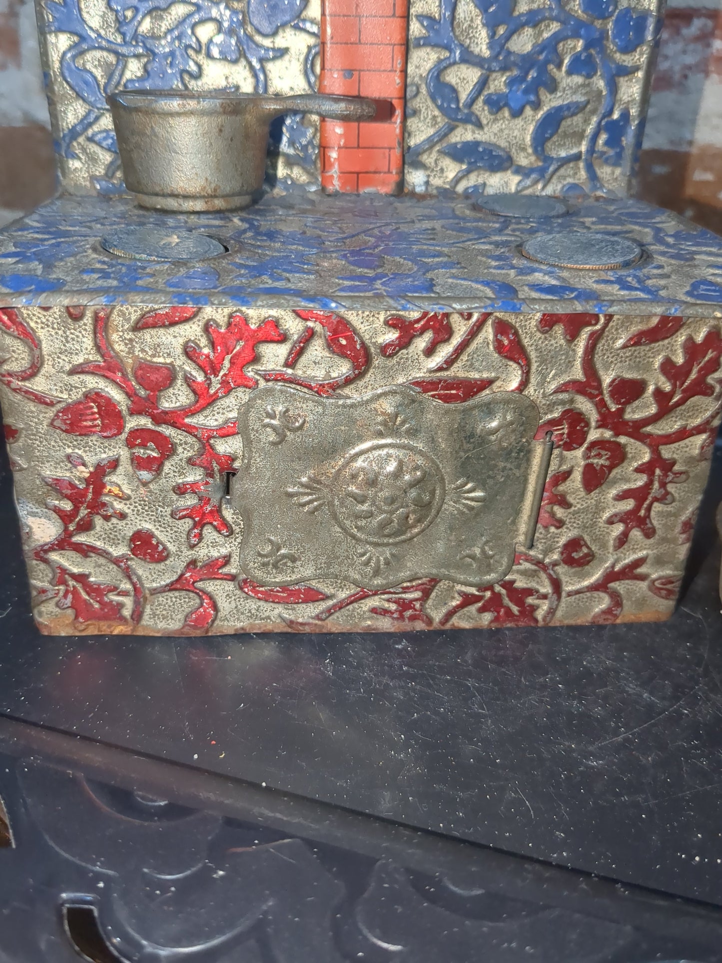 Antique German embossed wood stove with pans. Kid67