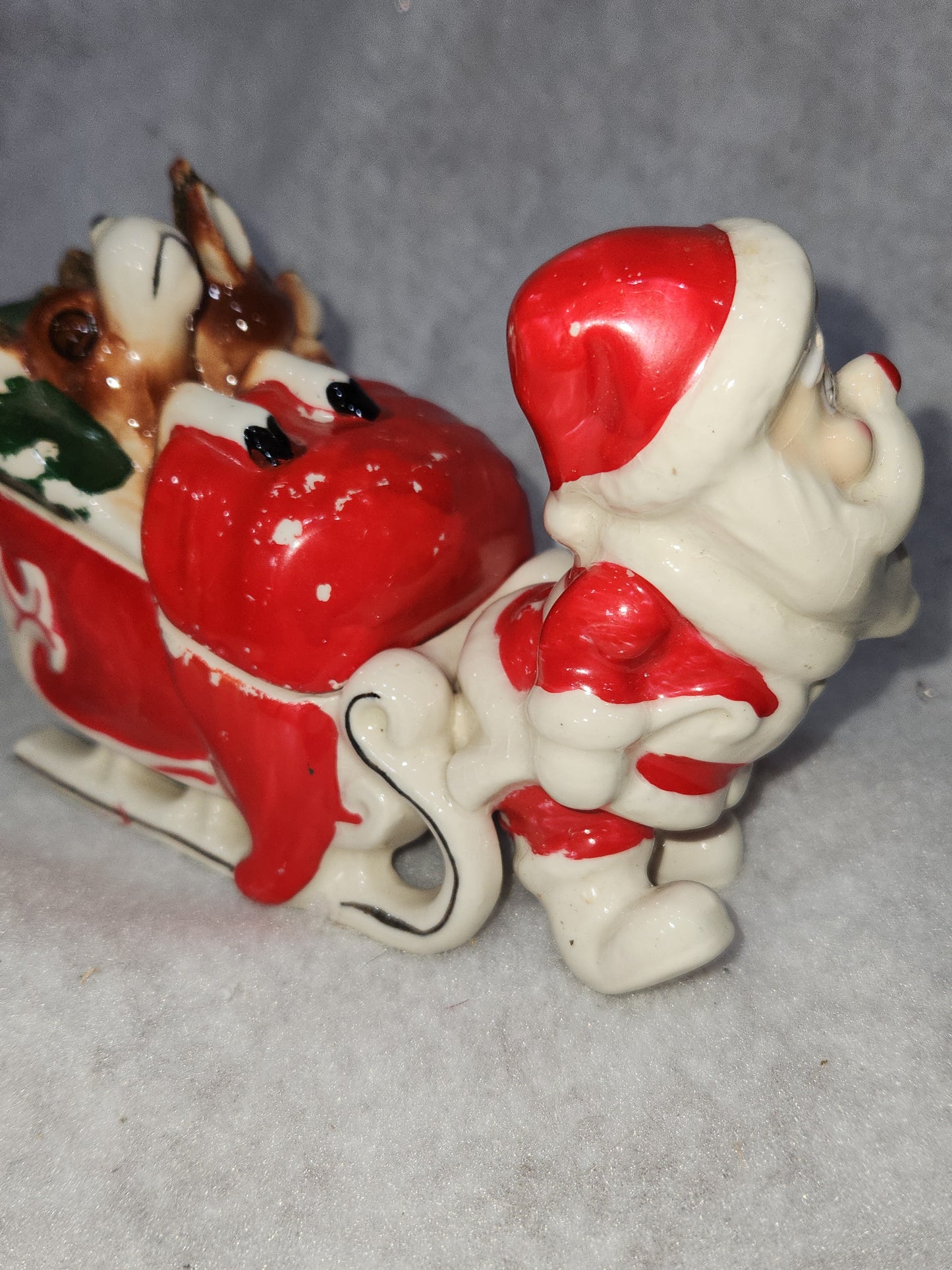 Vintage Kreiss Santa Pulling His Sleigh While his Reindeer are Snoozing inside Sleigh planter candy dish