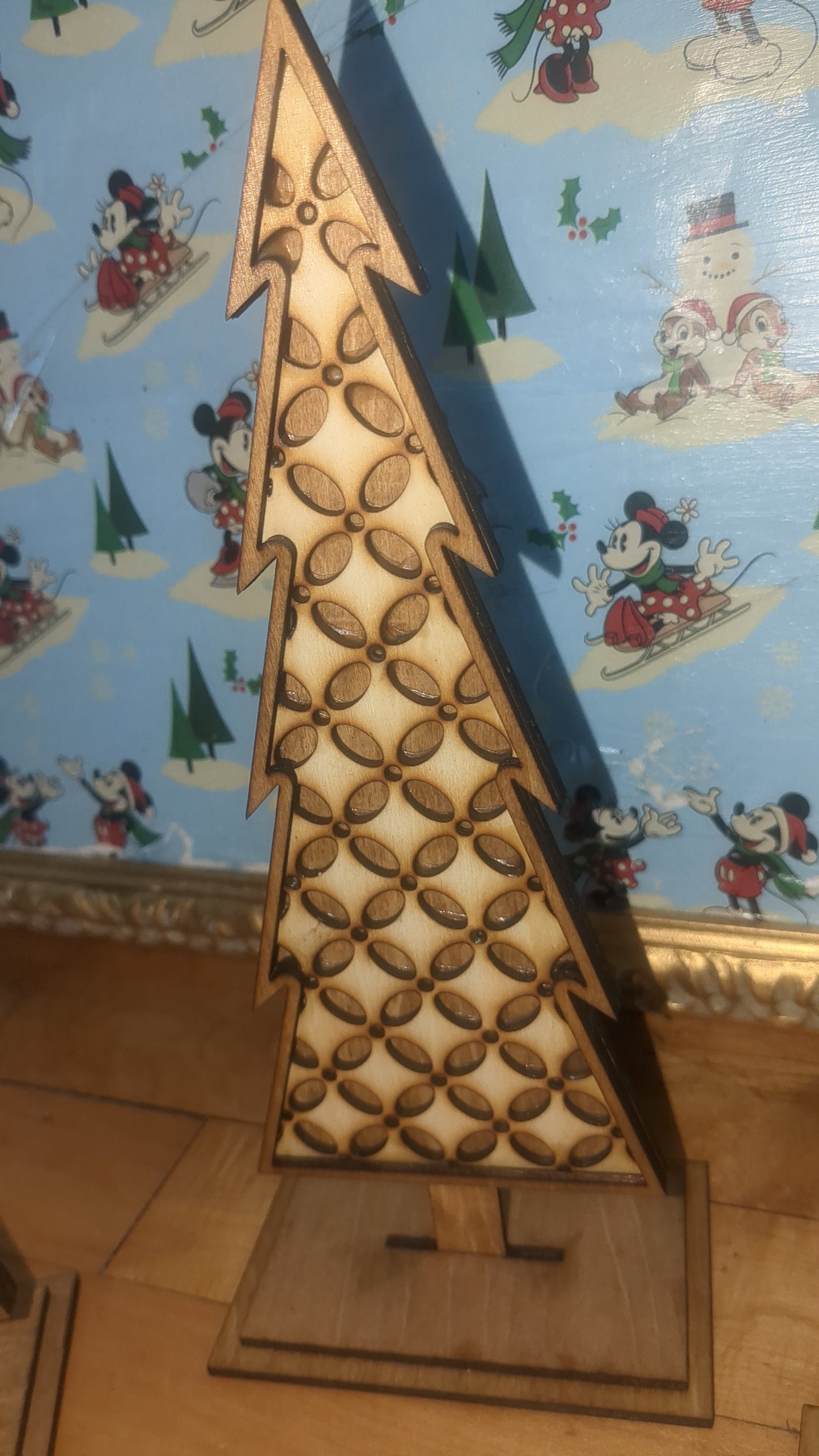 Standing wooden patterned layered trees. Unique decor pieces sold as a set.