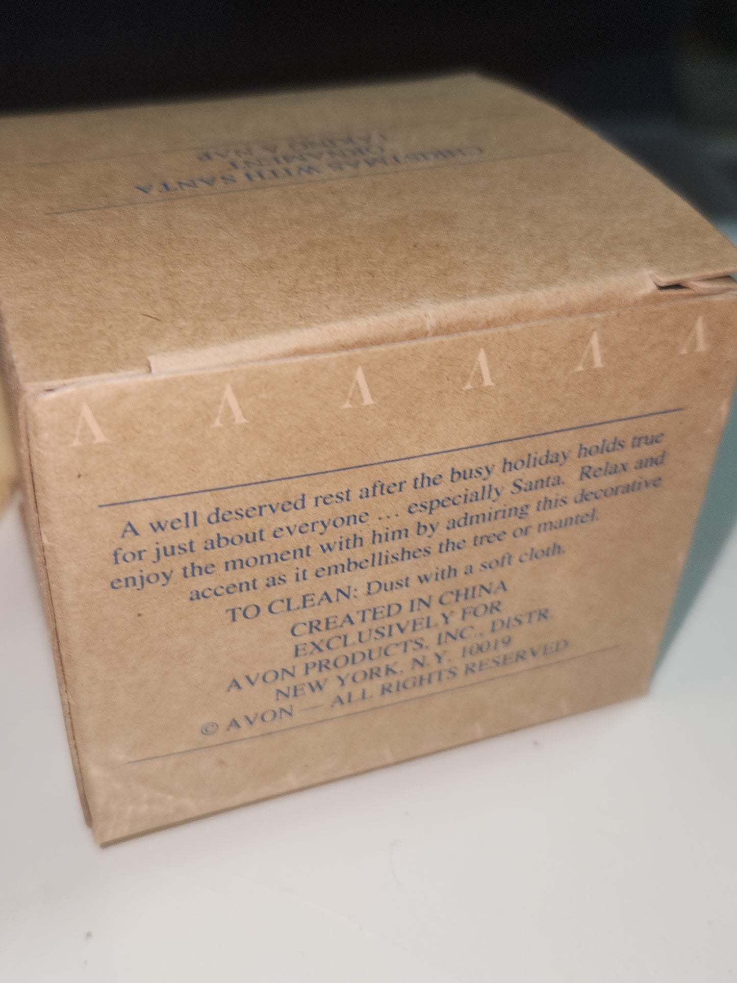 Avon Gift Collection Christmas With Santa Ornament Taking A Nap