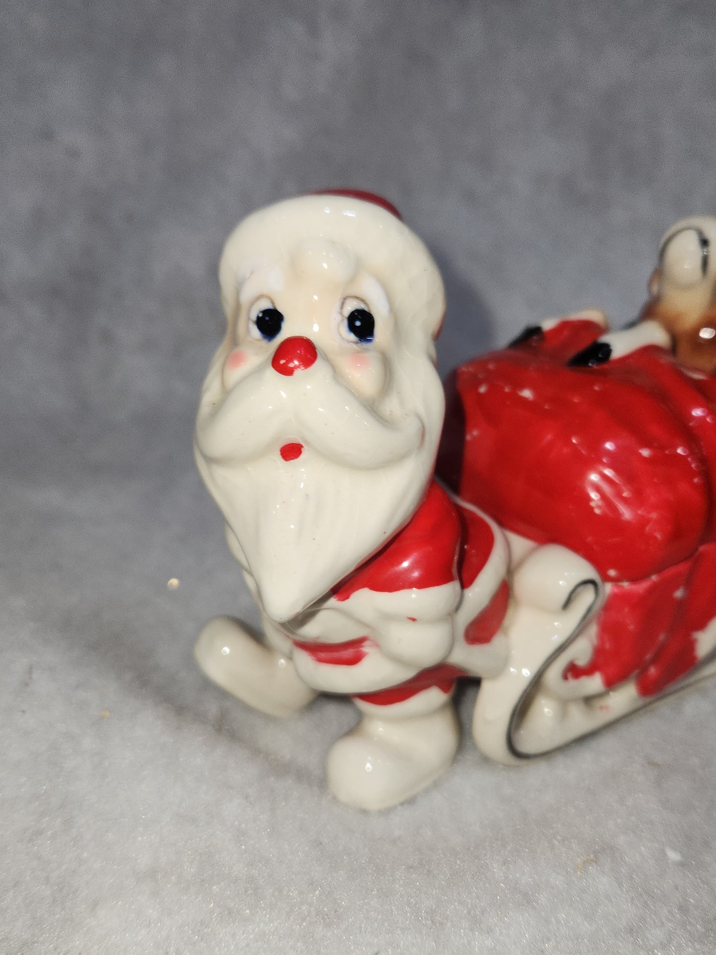 Vintage Kreiss Santa Pulling His Sleigh While his Reindeer are Snoozing inside Sleigh planter candy dish
