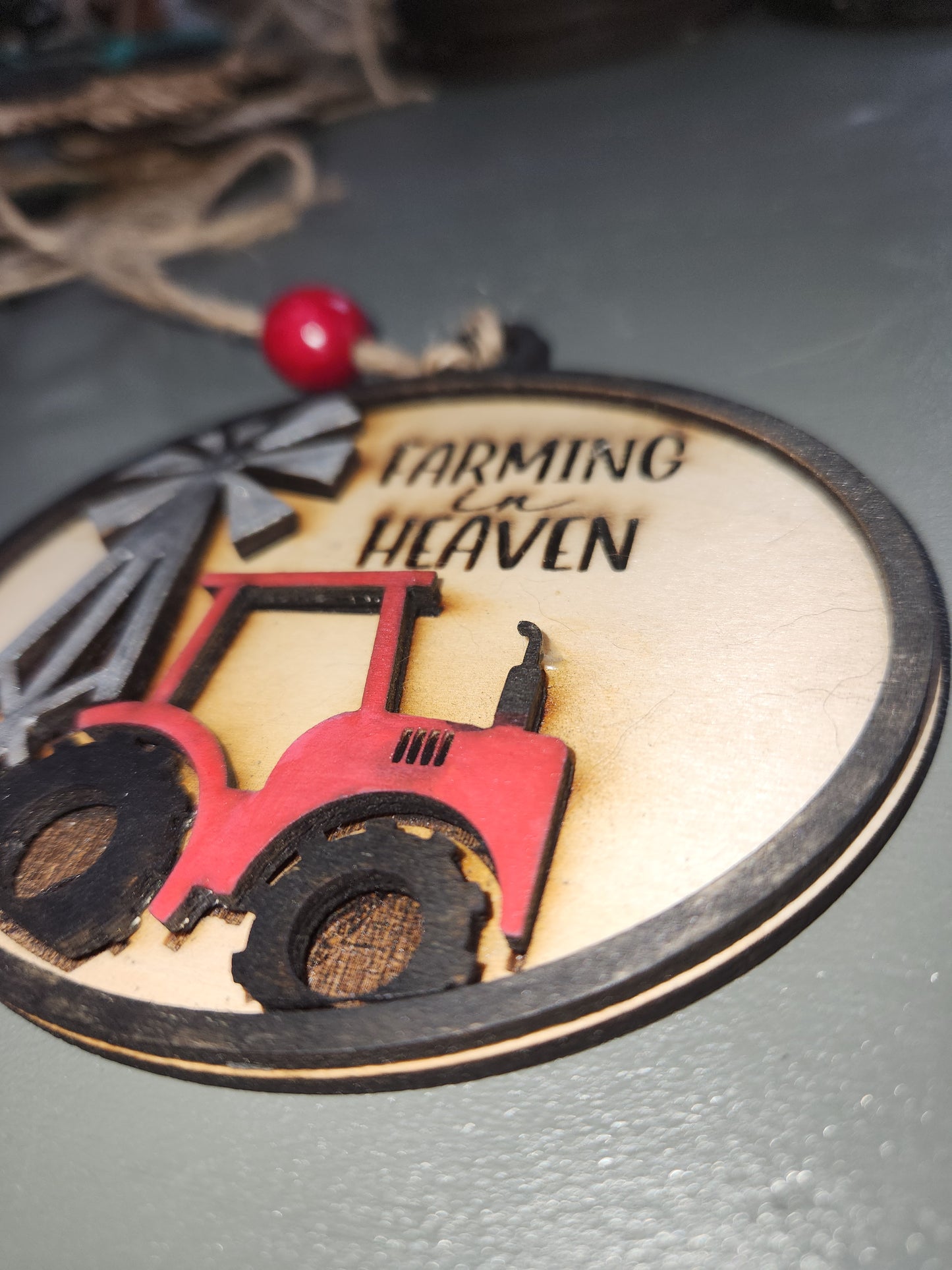 Ornament or car charm memorial memorial with red tractor and windmill