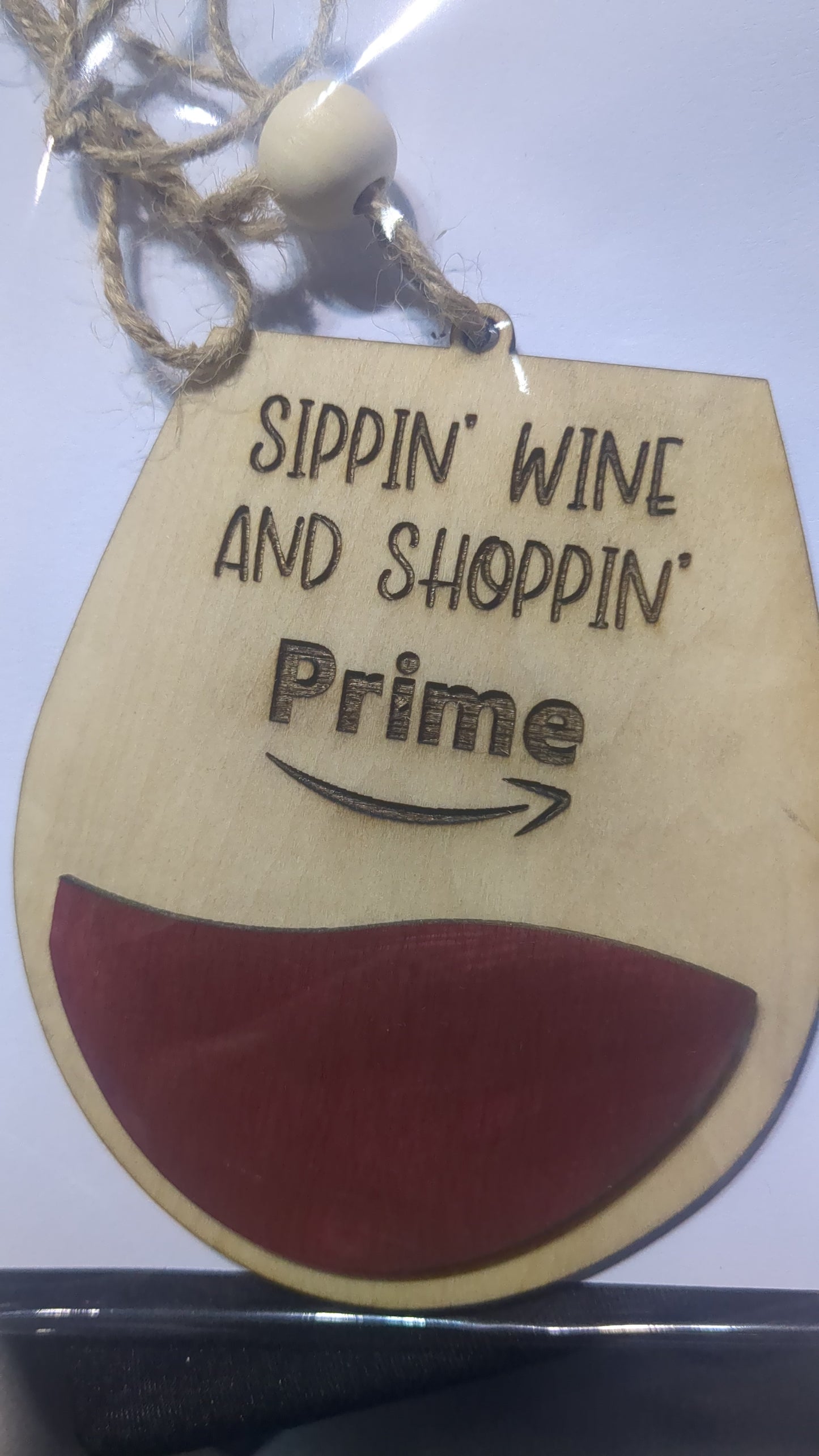 Ornament or car charm. Sippin wine and shoppin Prime. Red Wine glass